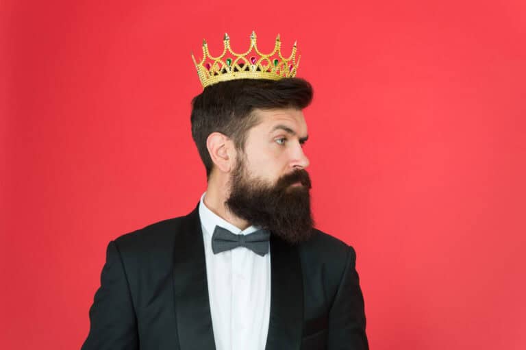 Vip. Big boss. Formal event. King crown. Formal wear male fashion. Egoist. Businessman in tailored tuxedo and crown. Vip man in suit. Bearded man in tuxedo and bow tie at vip party. vip client