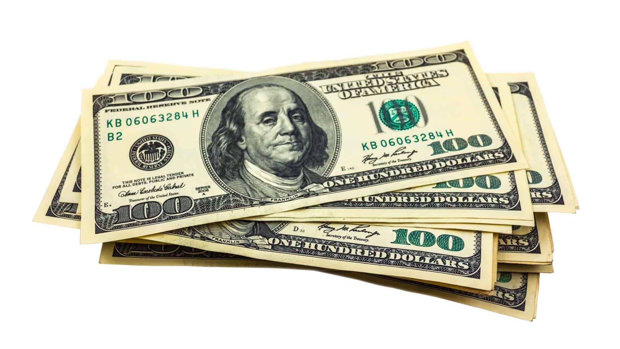 pack of US dollars isolated on a white