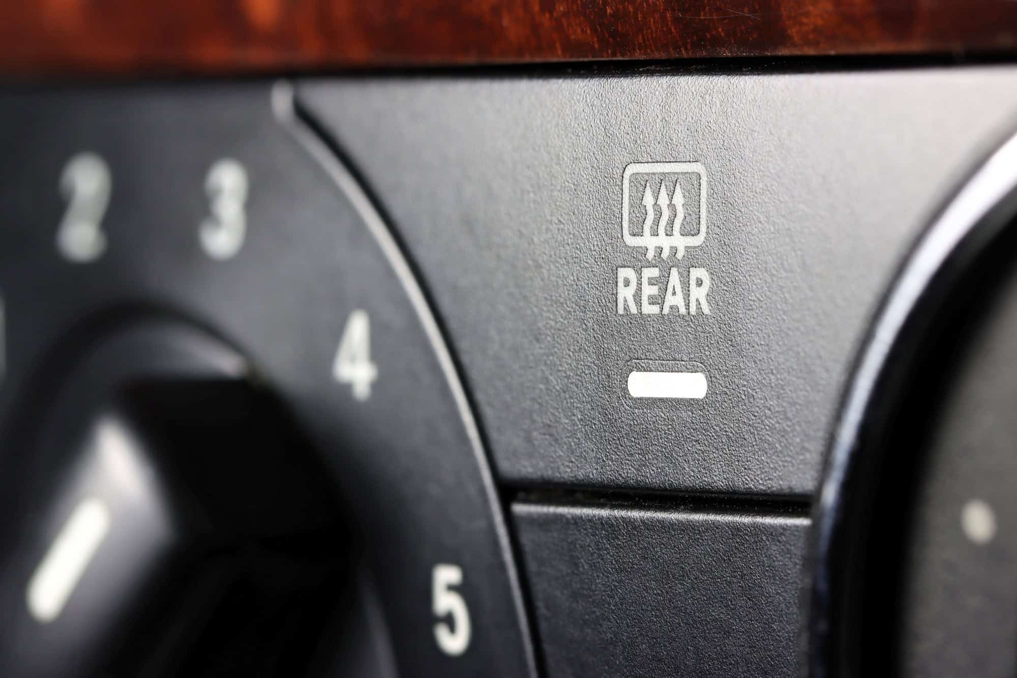 rear window heating switch inside a used car