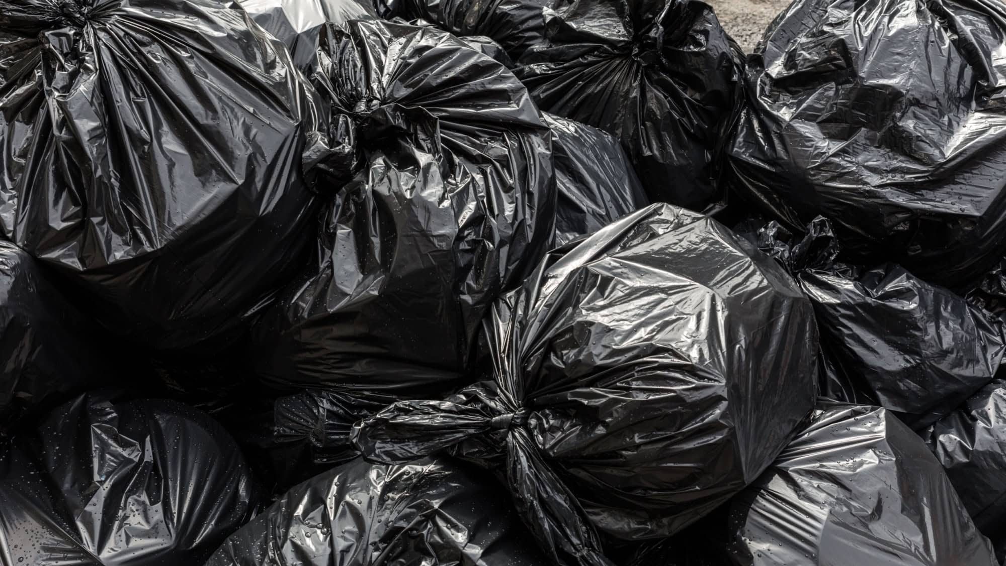 Background garbage bag black bin waste, Garbage dump, Bin,Trash, Garbage, Rubbish, Plastic Bags pile junk garbage Trash texture, Background waste plastic bin bag.