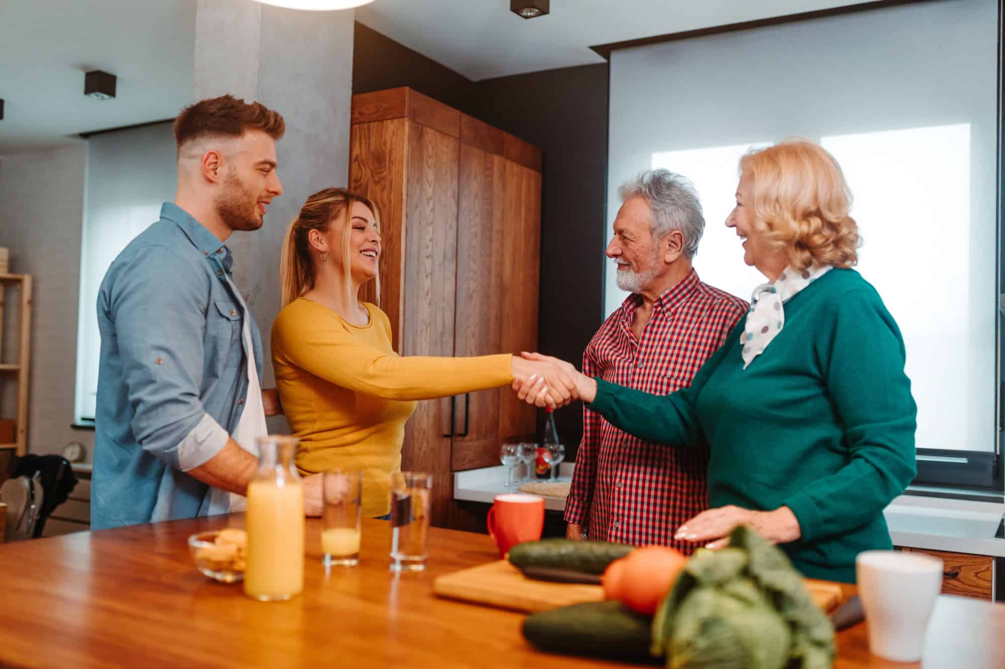 Man is introducing woman to his family.
