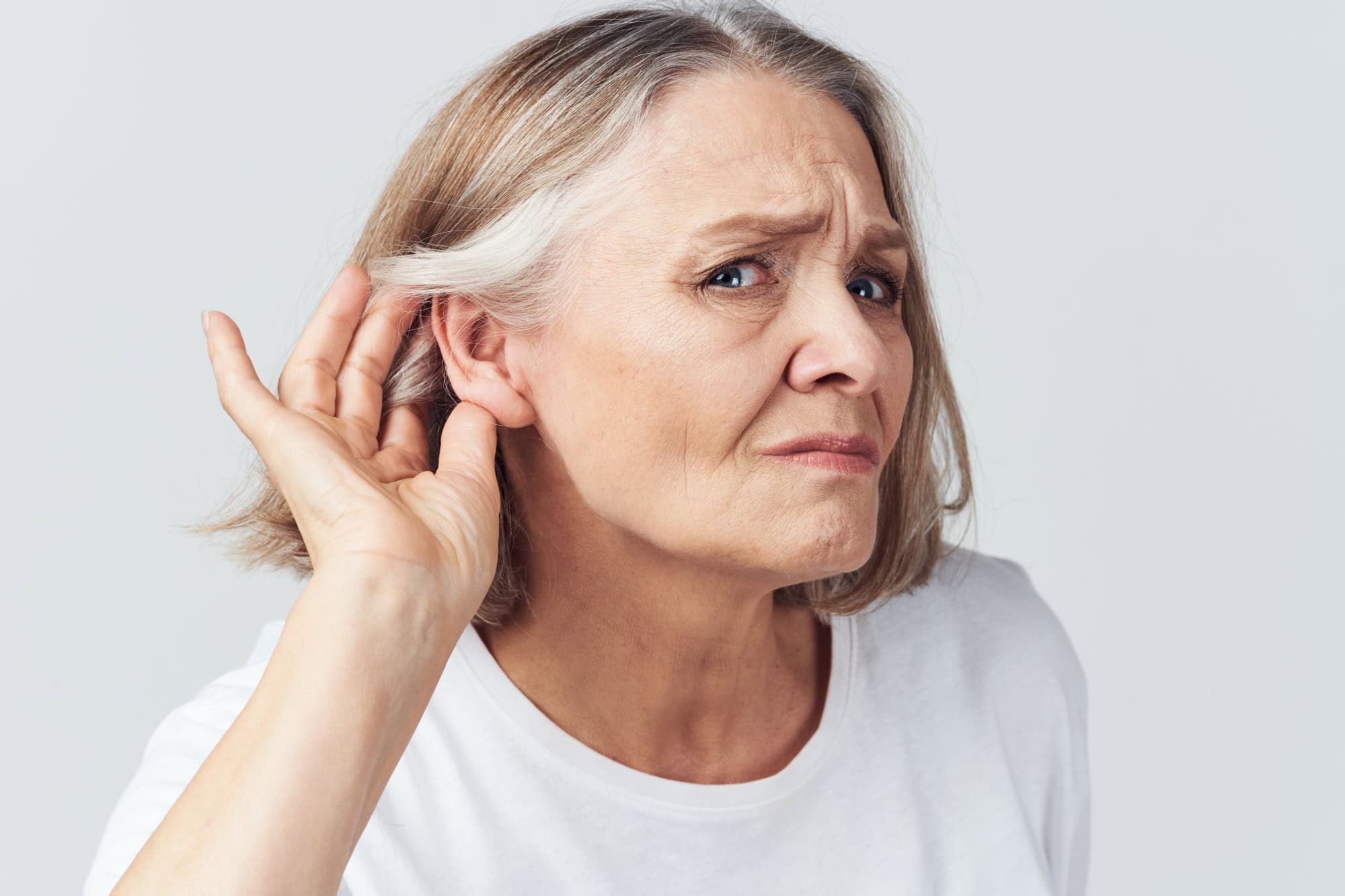 elderly woman hearing problems ear membranes