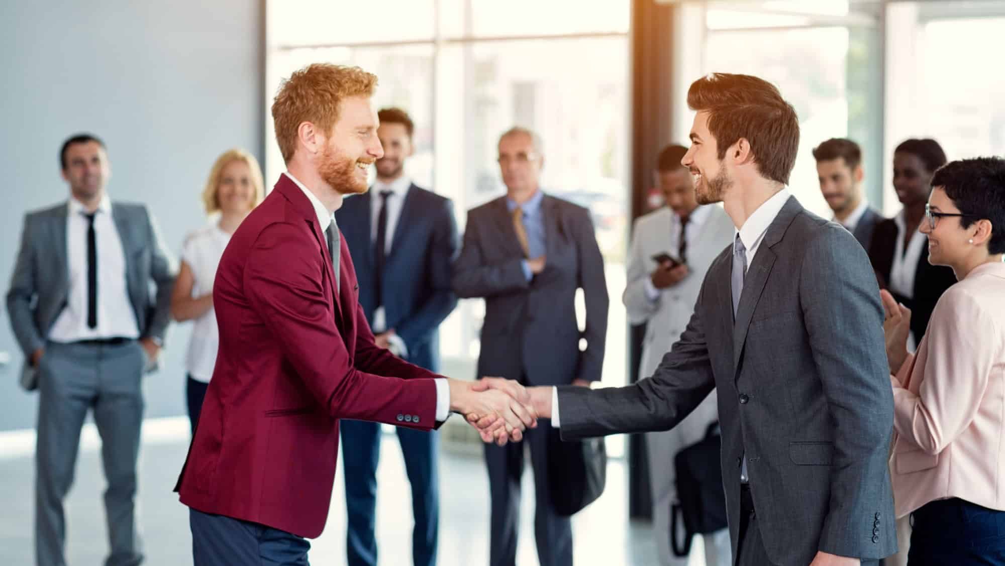business partners handshaking in the sign of successful dealing