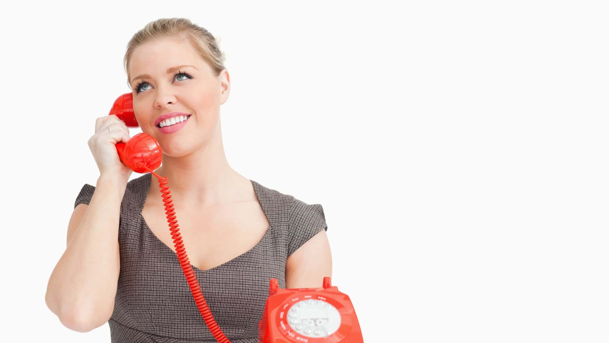 Woman calling with someone at the phone against white background