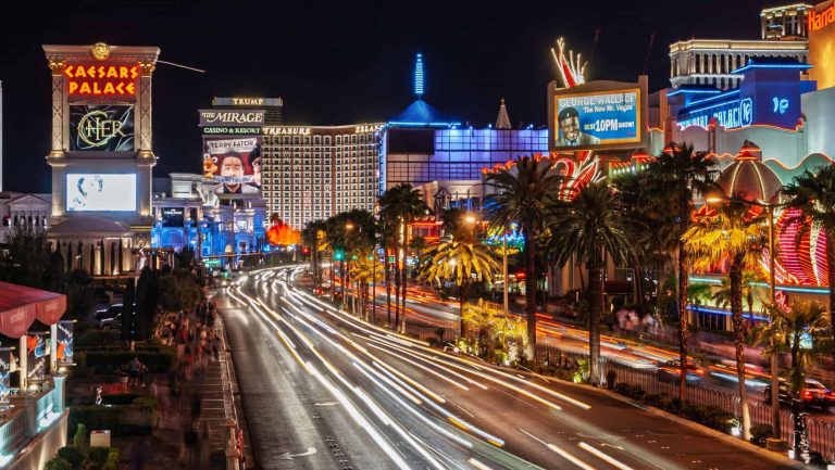 Las Vegas, Nevada. May 16 2010: Long exposure of las vegas strip at night showing light trails and illuminated hotels and casinos like caesars palace and the mirage