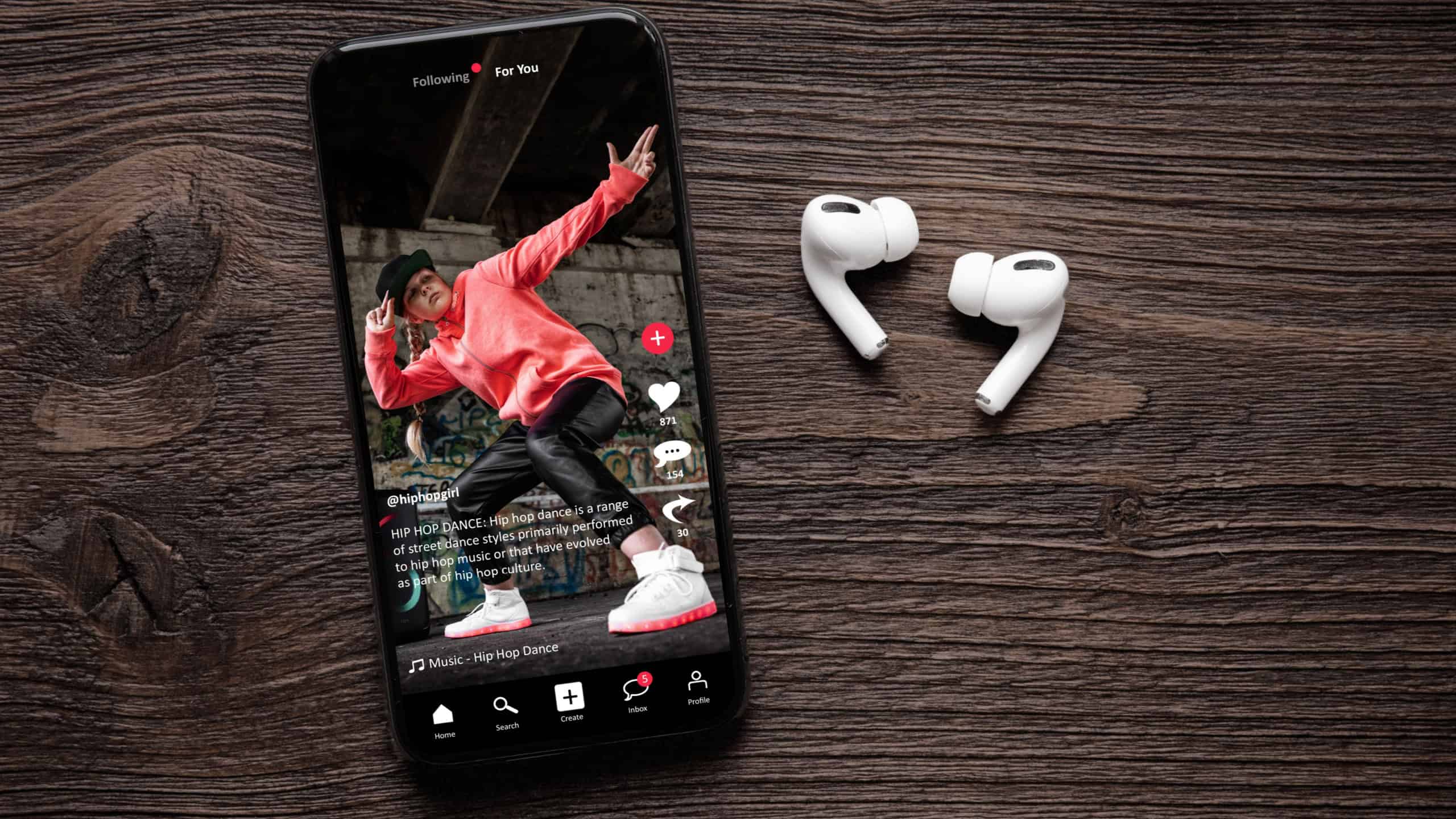 Sample social media app interface on mobile phone, concept of modern networking and sharing of video content