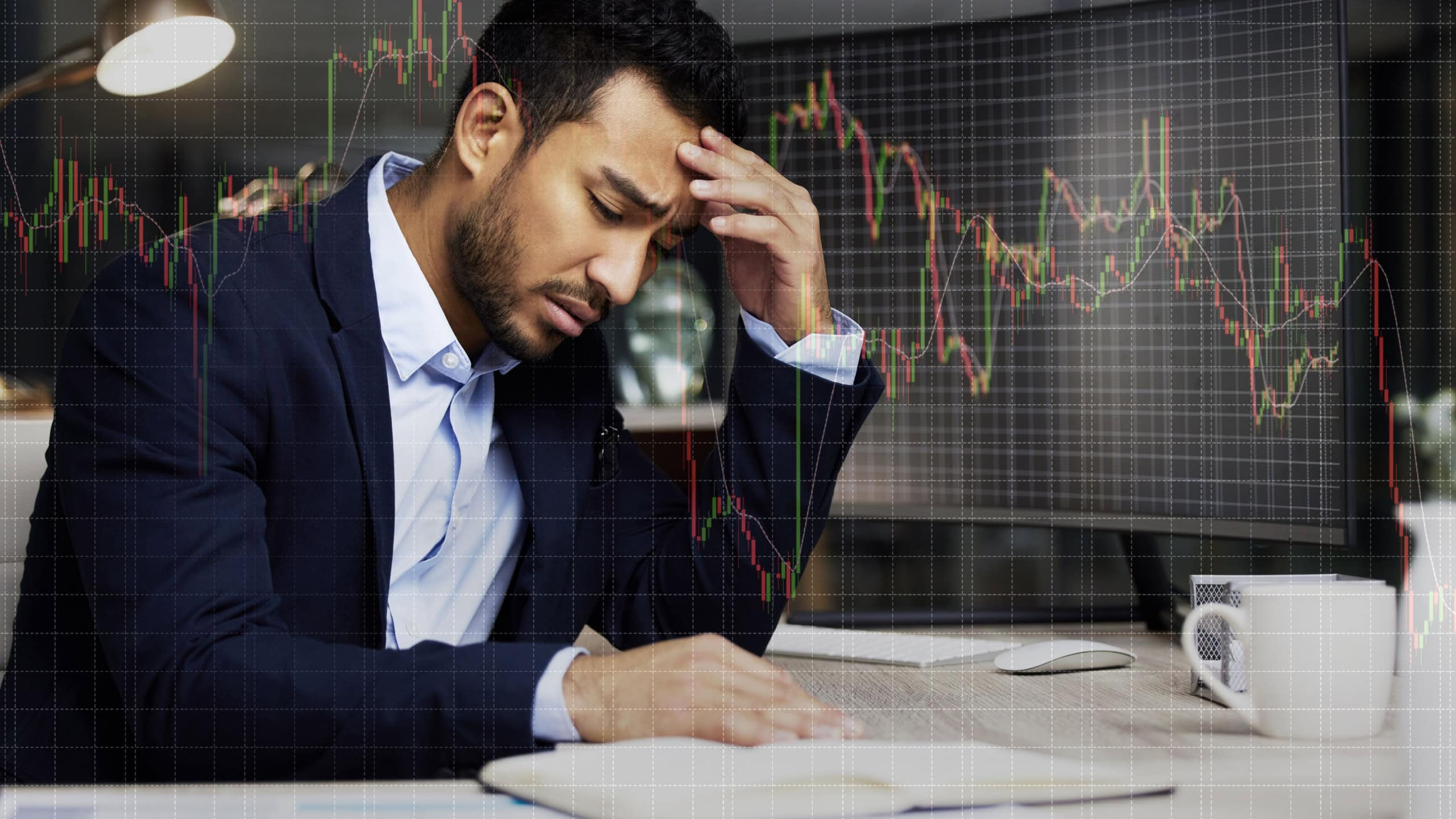 Businessman, computer chart and stress for trading mistake, recession and stock exchange overlay in office. Trader, graph monitor and fear for investment crisis with anxiety, economy and profit loss