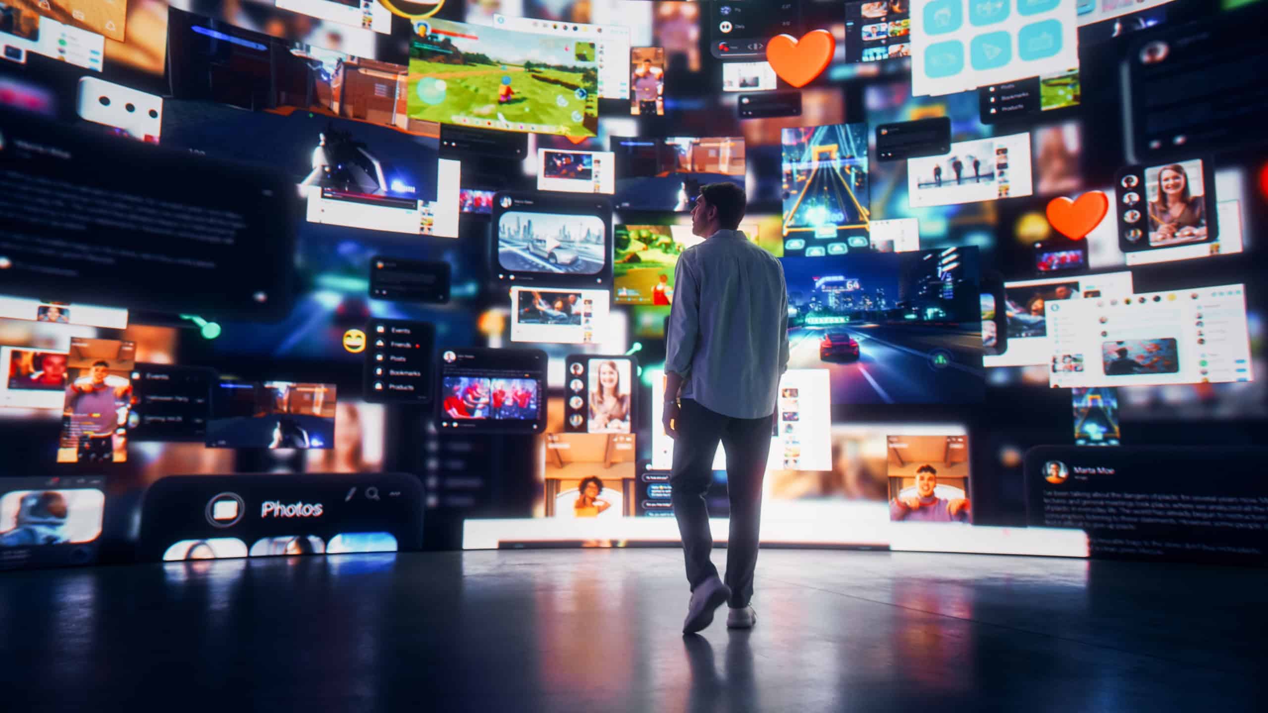 Backview Of Caucasian Man Looking at Animated Stream Of Content. Visualization Of Browsing Metaverse Big Data with Viral Videos, Social Media Profiles with Influencers, and Internet Communities.