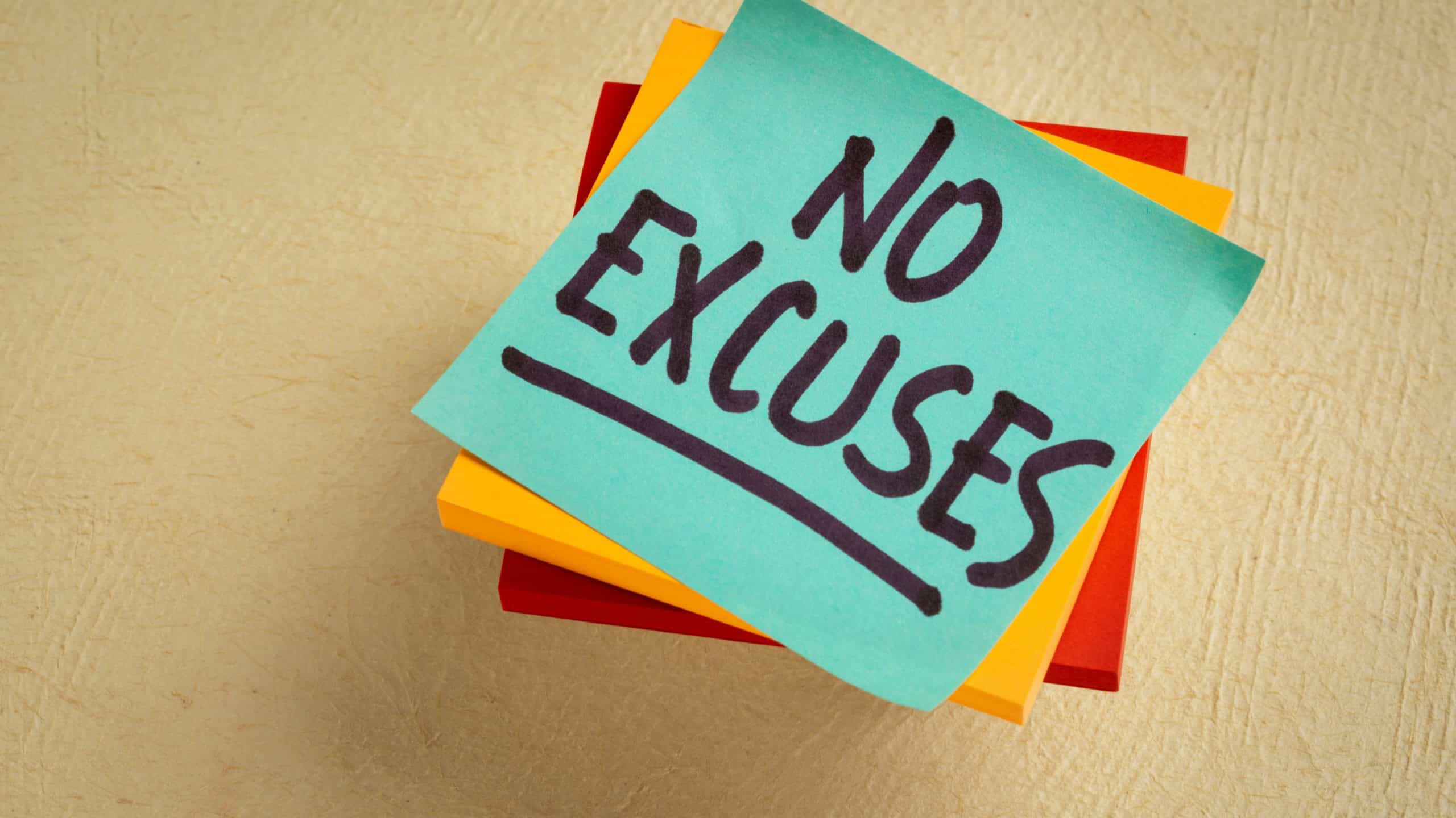 No excuses reminder. A motivational handwriting on a sticky note.