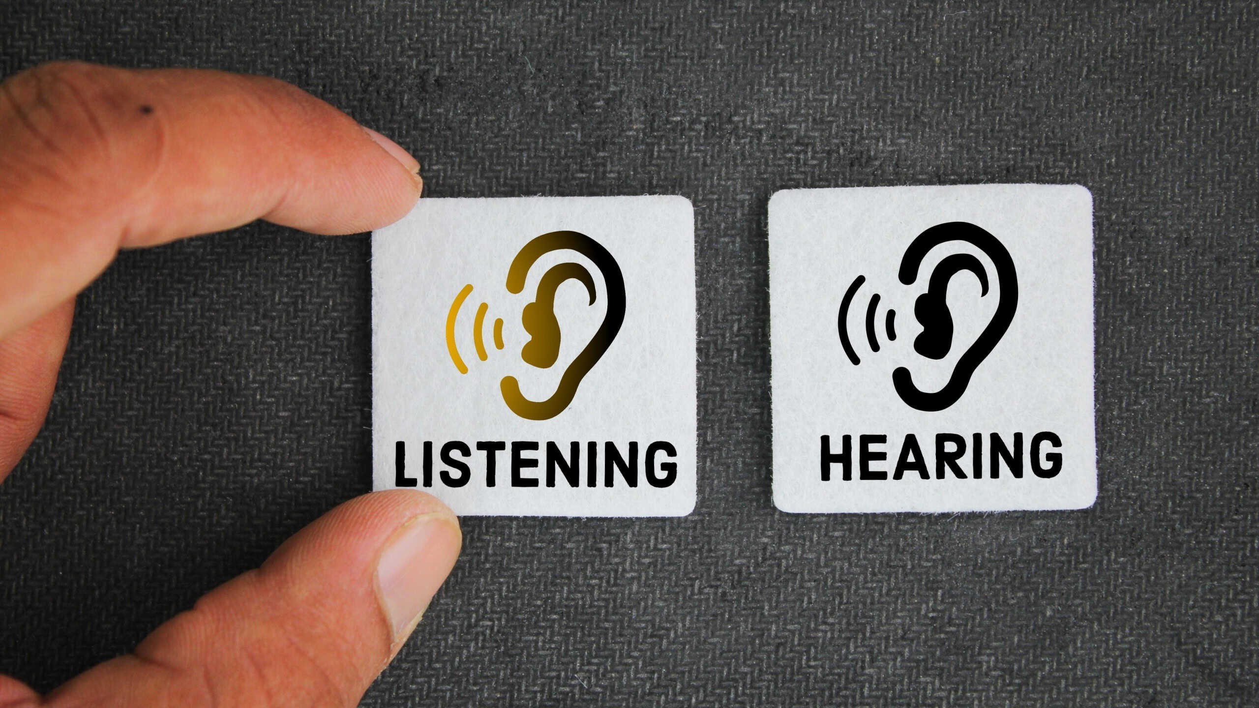 between the words HEARING and LISTENING, choose listening. concept of choosing to listen than just here, pay more attention and understand the meaning behind the words