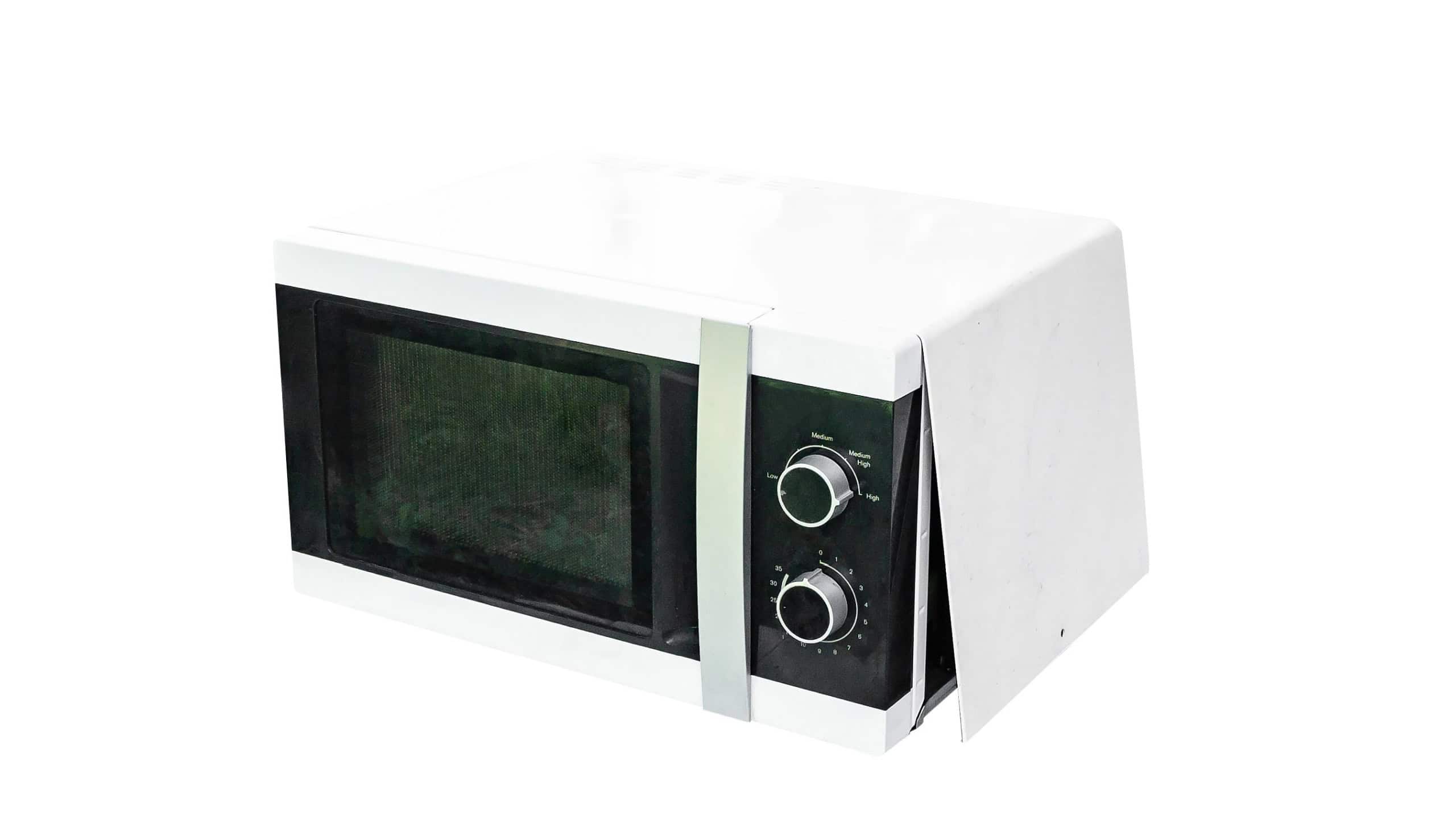 Isolated Broken microwave oven on white