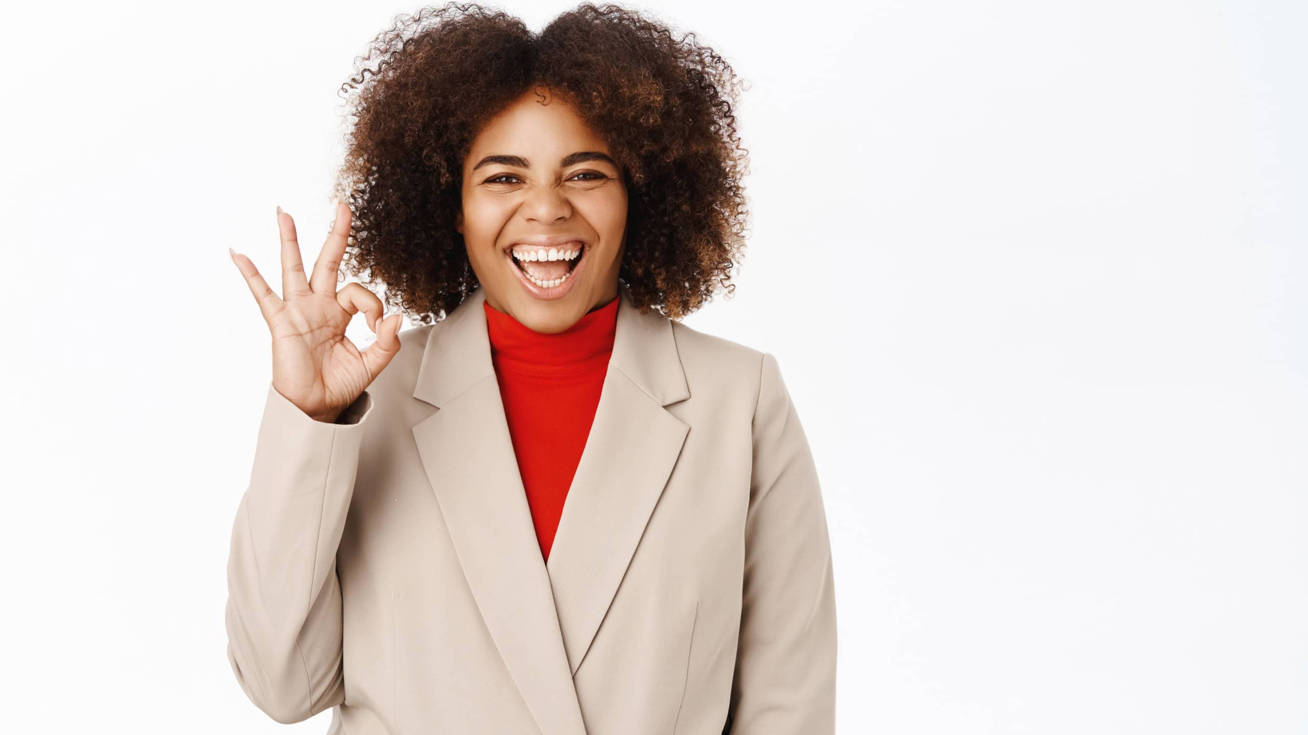 Corporate people. Happy african american businesswoman praise smth excellent, gives compliment, positive feedback, stands over white background.