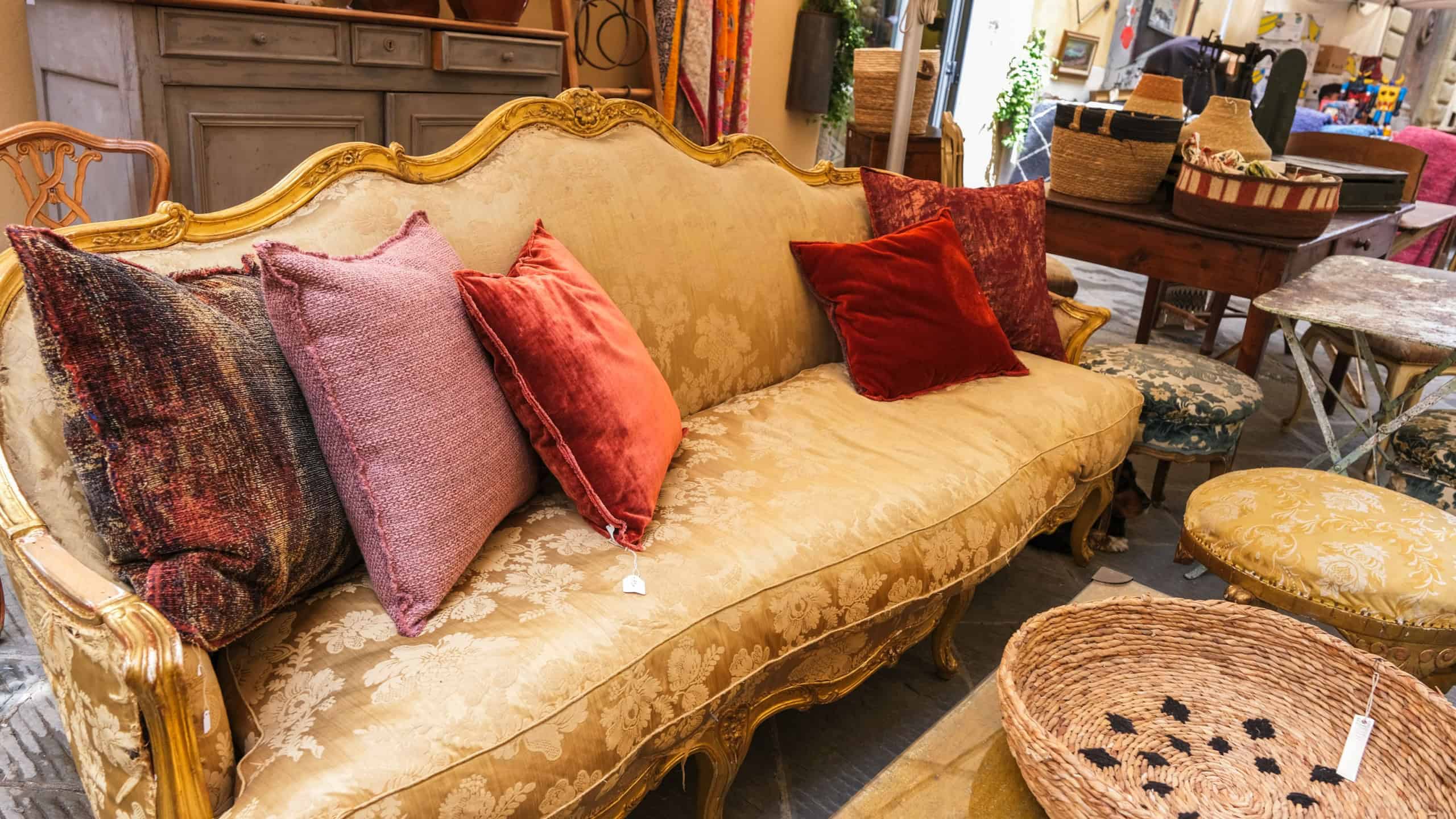 Old furniture sofa on antiques flea market in Arezzo Italy