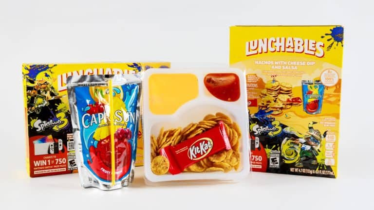 July 6, 2023. Spartanburg, SC USA. Lunchables kit featuring cheese dip, crunchy chips, and sweet treat alongside fruit drink.