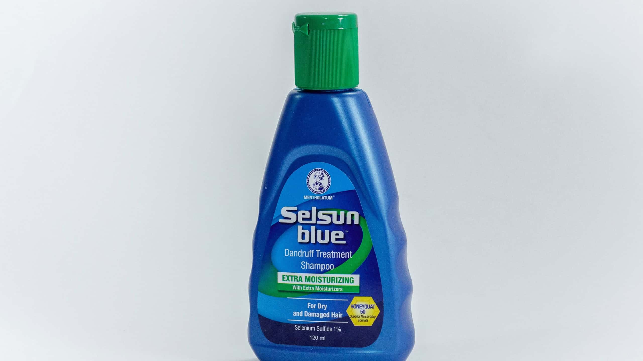 Labuan,Malaysia-Apr 8,2017:Bottle of Selsun blue,dandruff treatment shampo in Labuan,Malaysia.This shampoo is specifically formulated to control scaling,flaking & itching scalp.