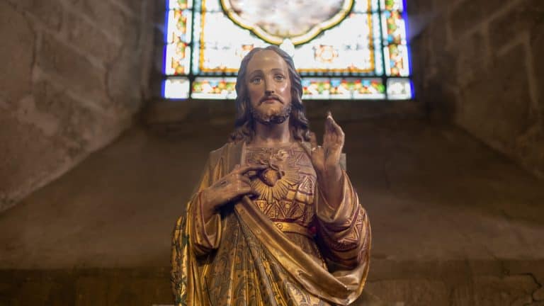 Statue of Jesus with a red heart