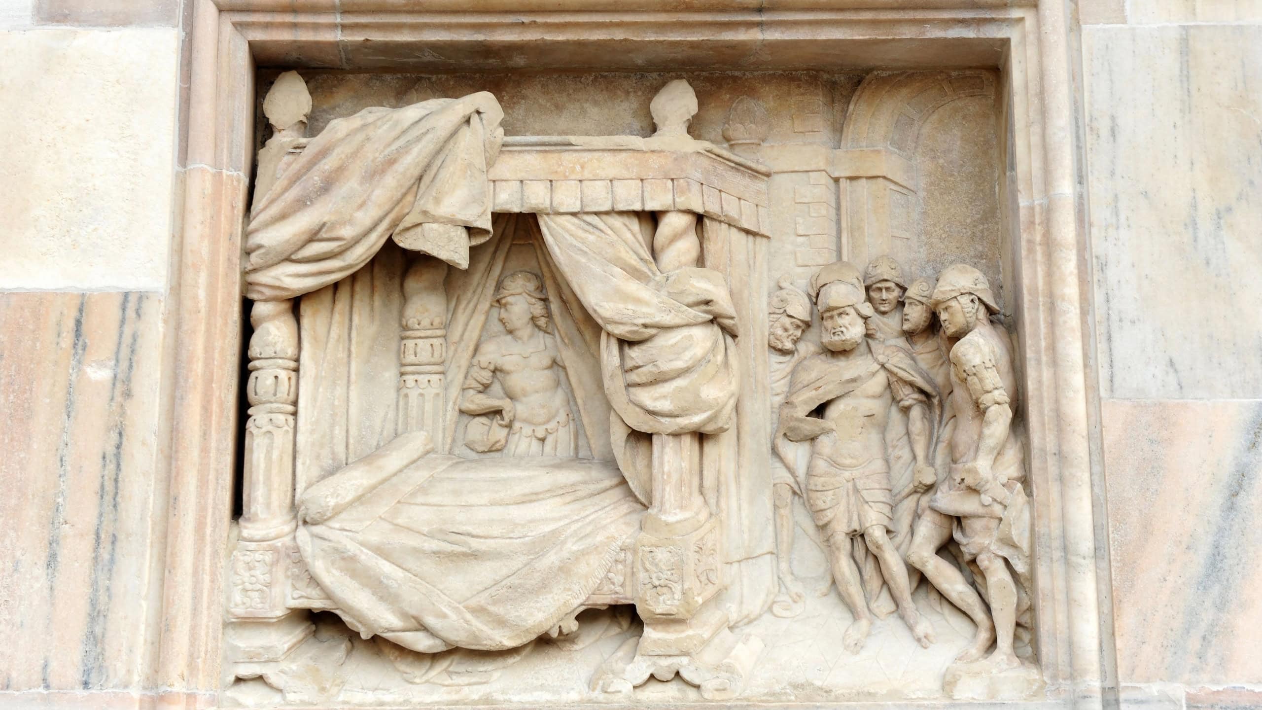 Milan, Italy; Dec 04 2019: The soldiers messengers of King Saul searching for David to kill him. Facade of the Cathedral of Milan (Duomo di Milano).