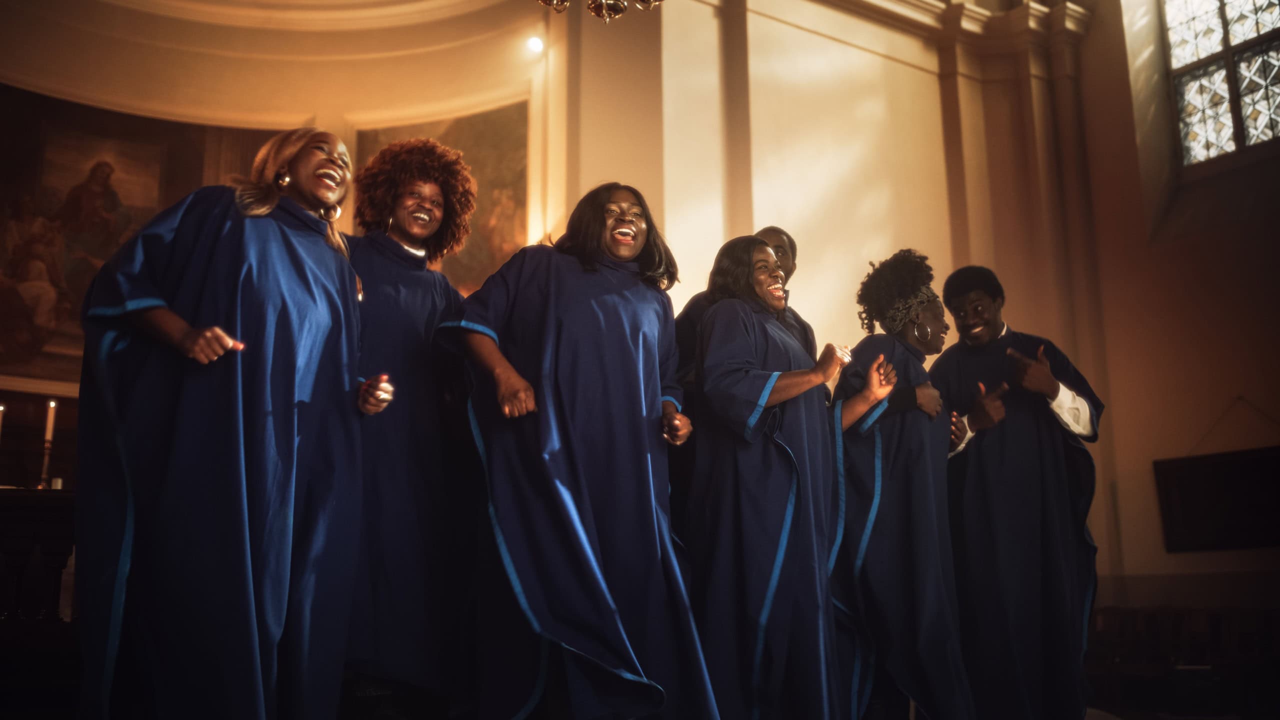 Black Christian Gospel Singers in Church Clapping and Stomping, Praising Lord Jesus Christ. Song Spreads Harmony Joy and Faith. Energetic Choir Sharing the Message of Christianity with Uplifting Music