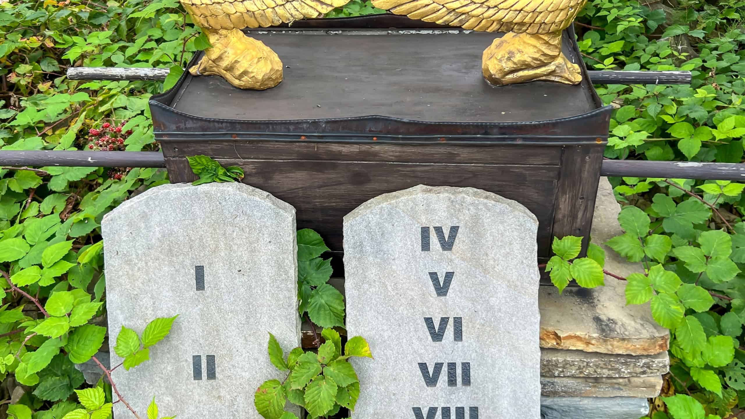 Biblical Garden in Muszyna, Poland. Stone tablets with God's commandments and the ark of the covenant.