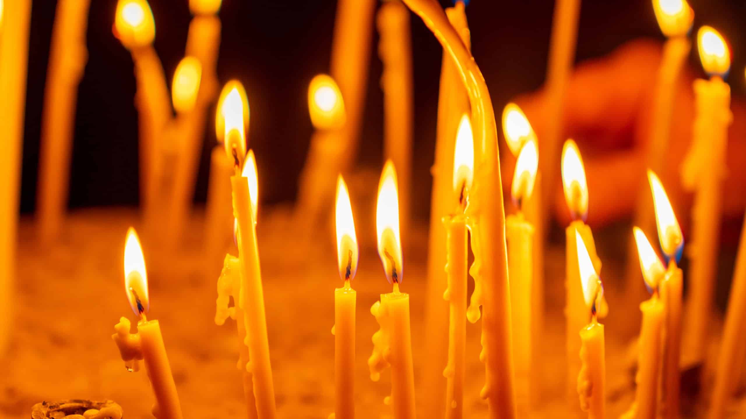 Burning church candles in an Orthodox church. Religion