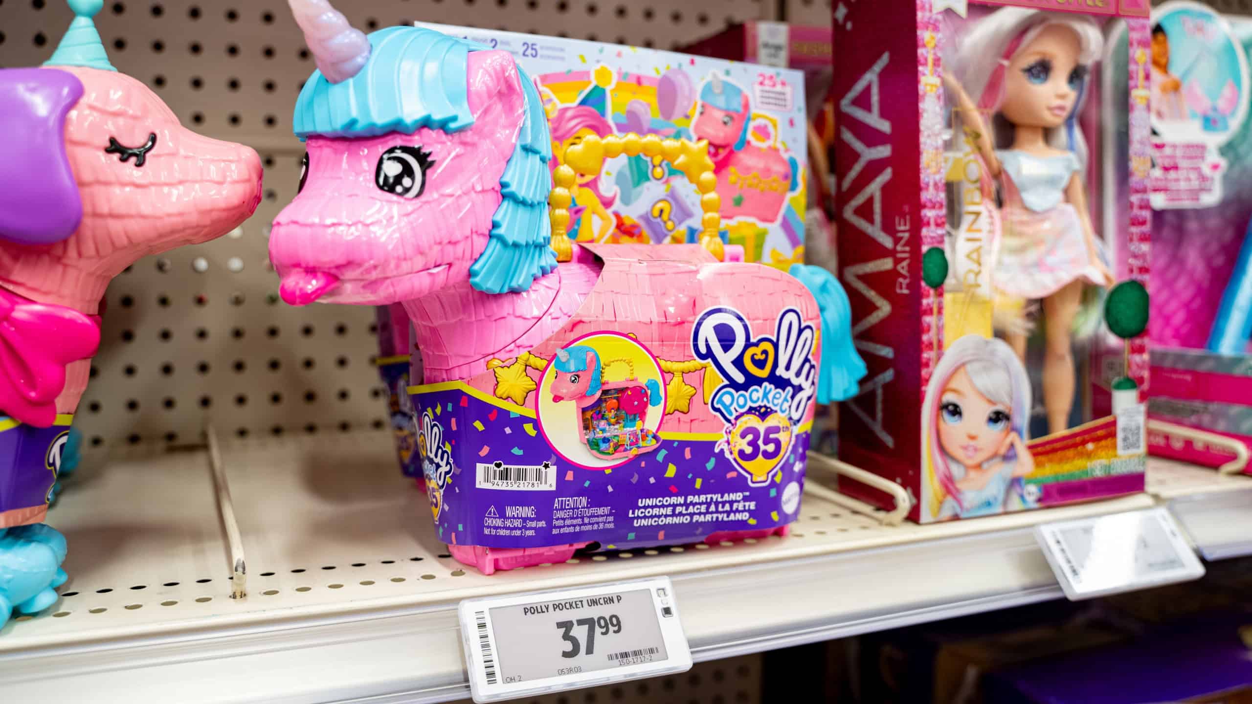 Close up of Polly Pocket Unicorn playset on toy store shelf. Brampton, Canada - November 16, 2025.