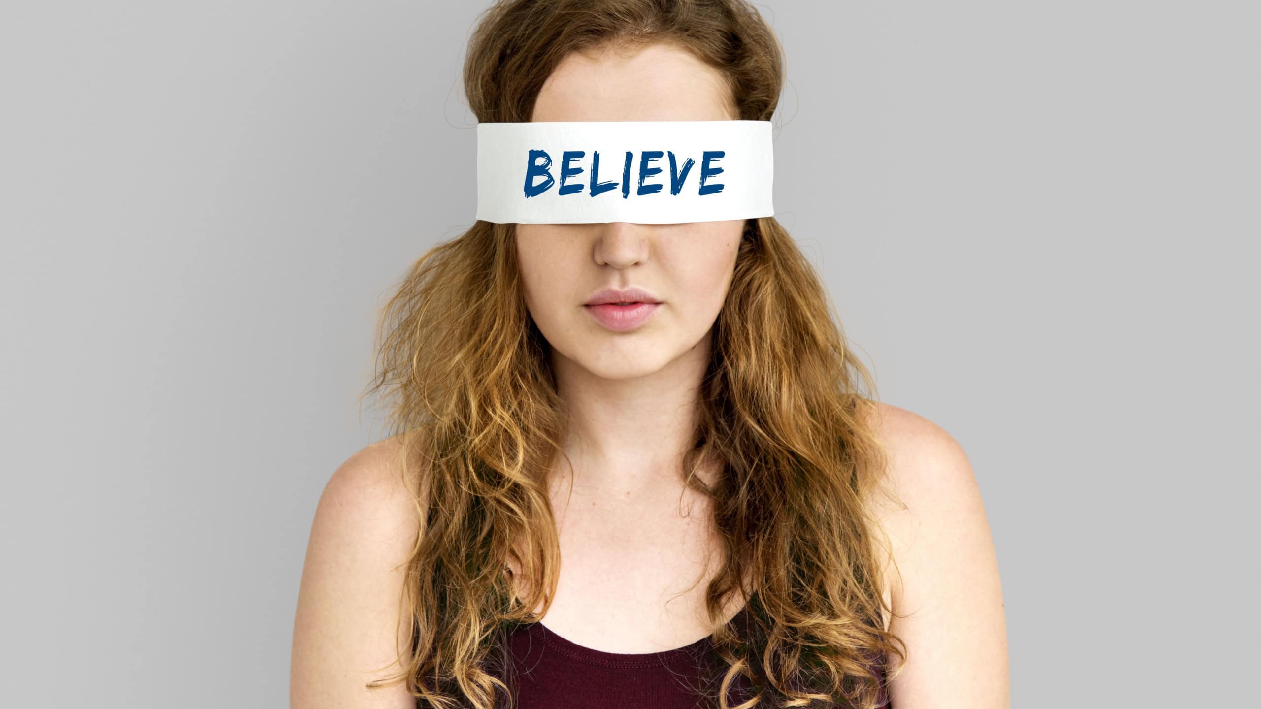 One Brazilian young woman in prayer during difficult times. A South American black latina adult girl seeking help and support. Hope and Faith concept