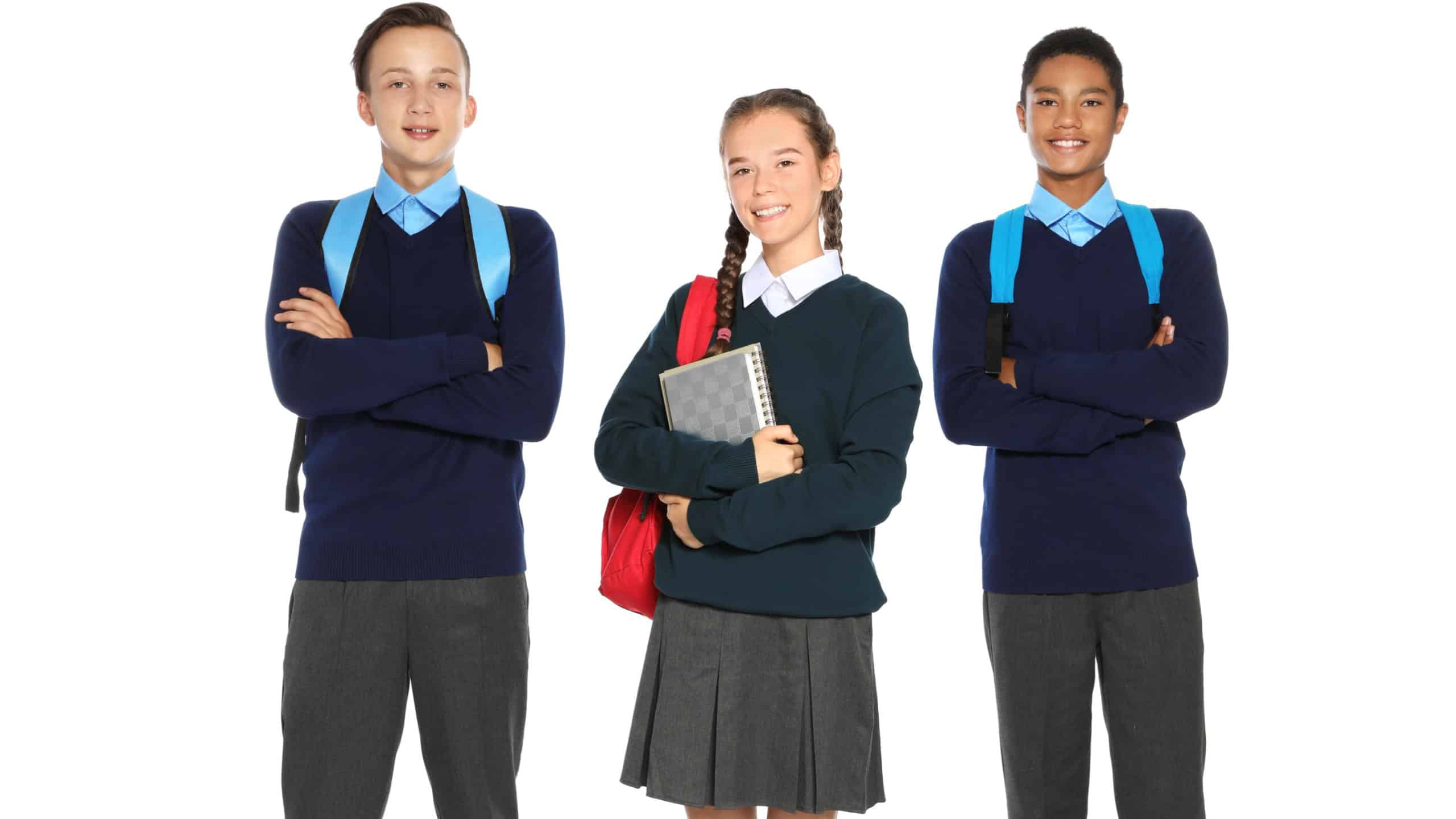 Teenagers in stylish school uniform on white background