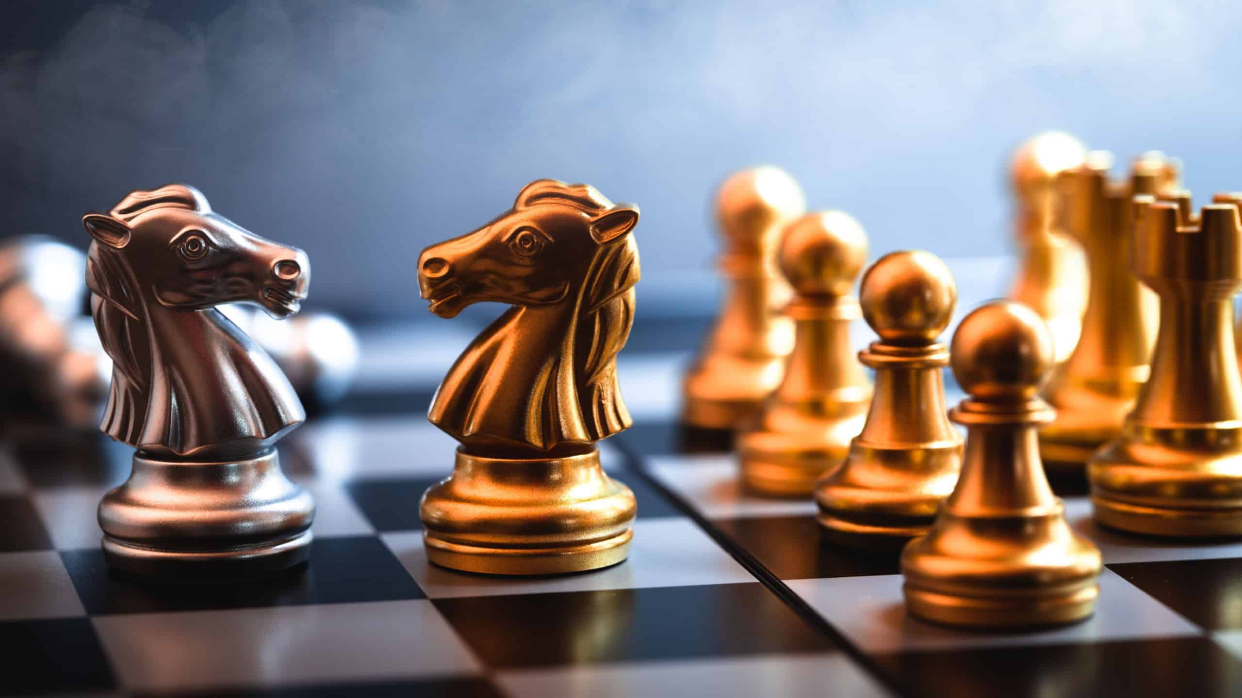Chess horse faced together represent of negotiating a rival or business enemy in a trading war game.