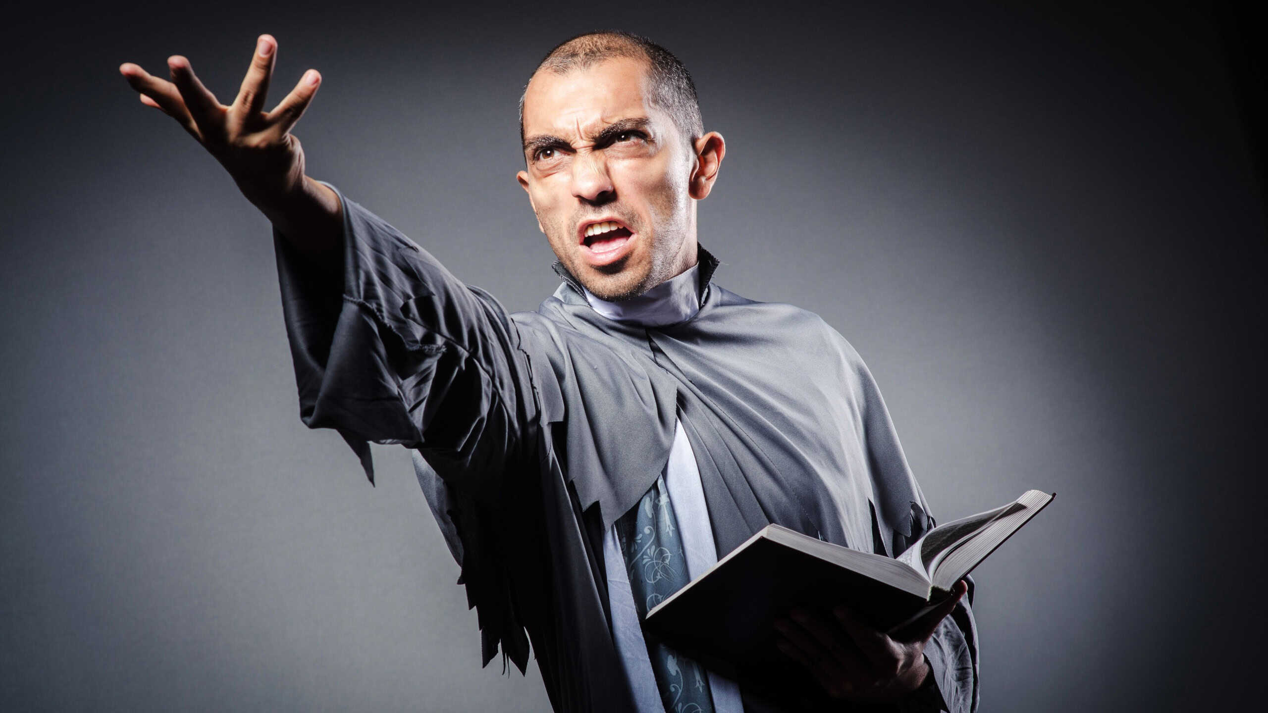 Young priest yelling and shouting