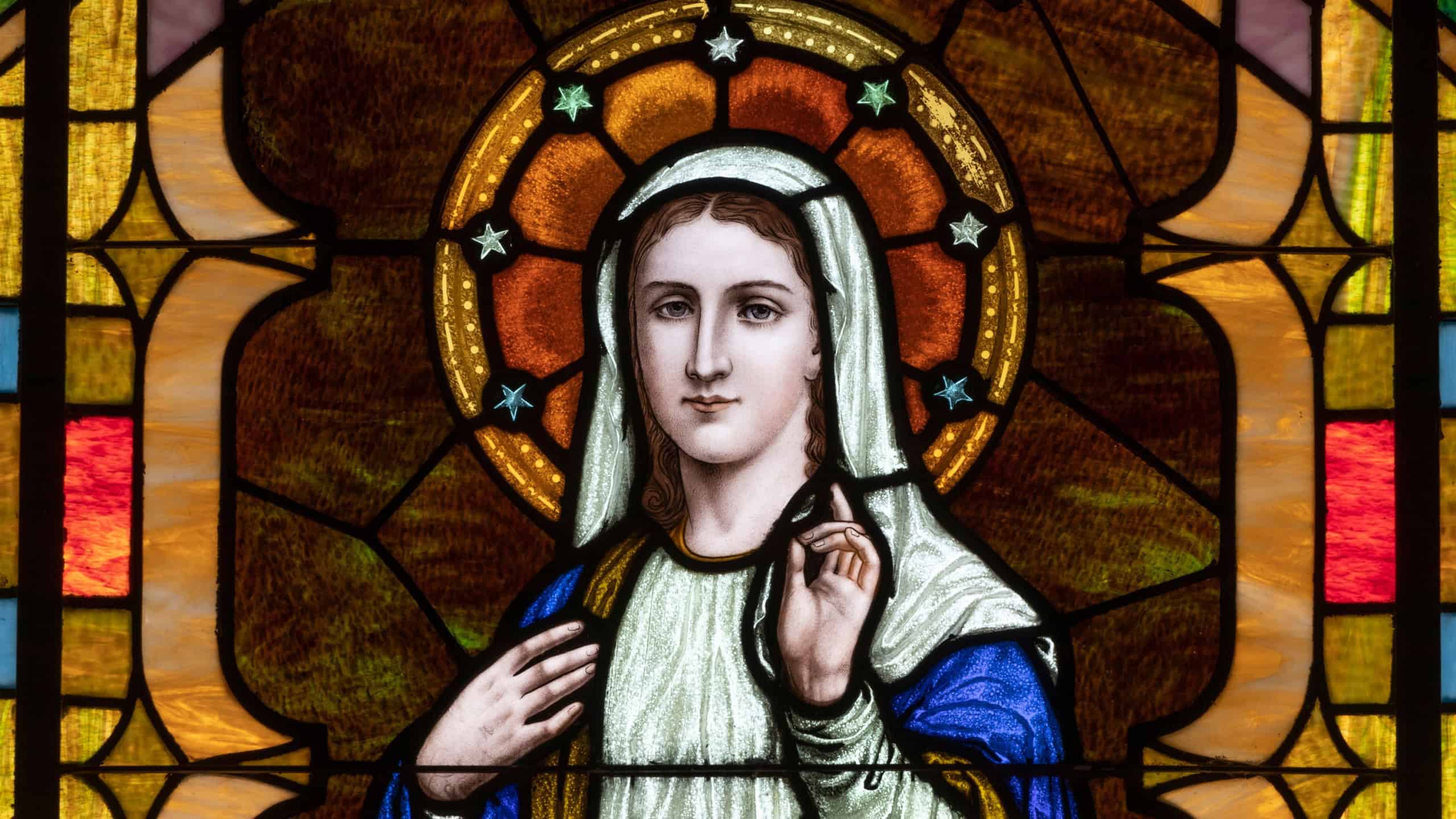 Depiction of Mary, mother of Jesus Christ in stained glass at a church