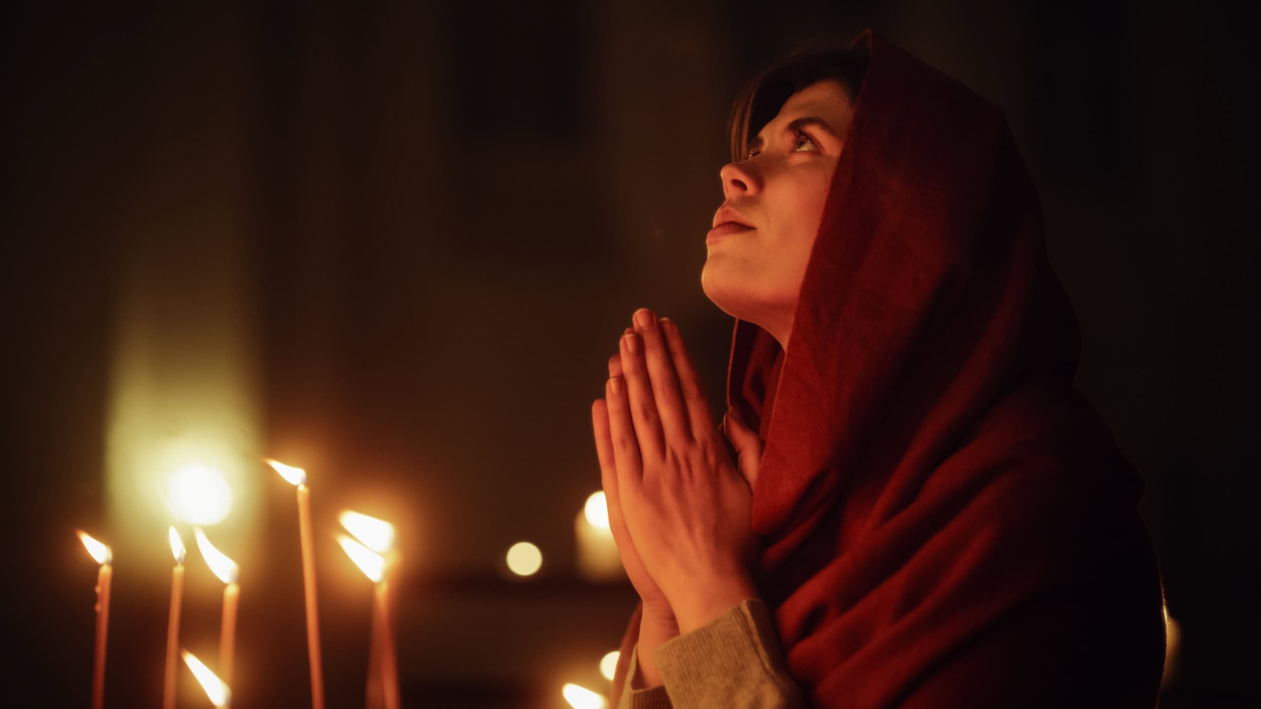 Christian Woman with Head Scarf Praying