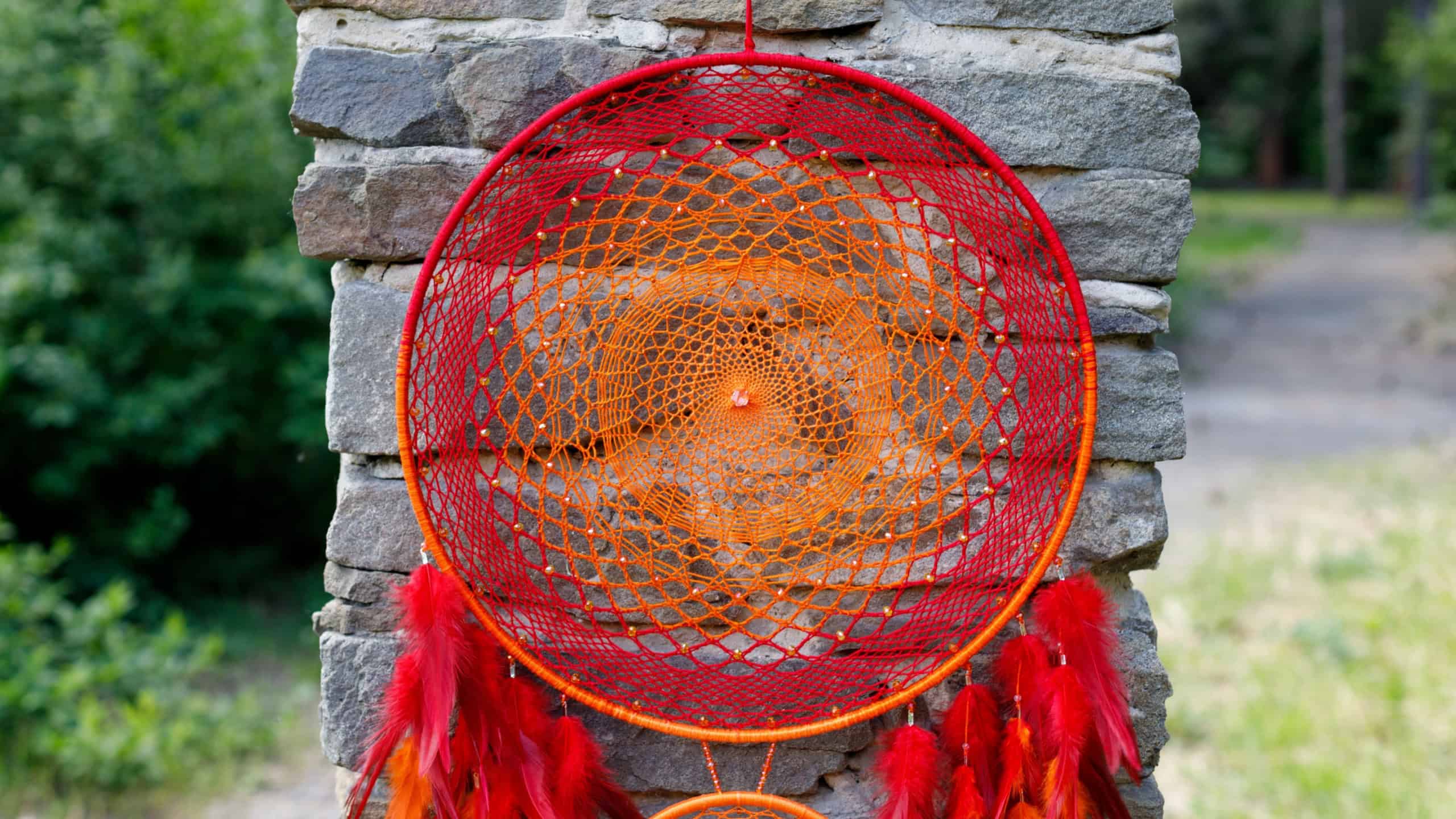 Dream catcher with feathers threads and beads rope hanging. Dreamcatcher handmade