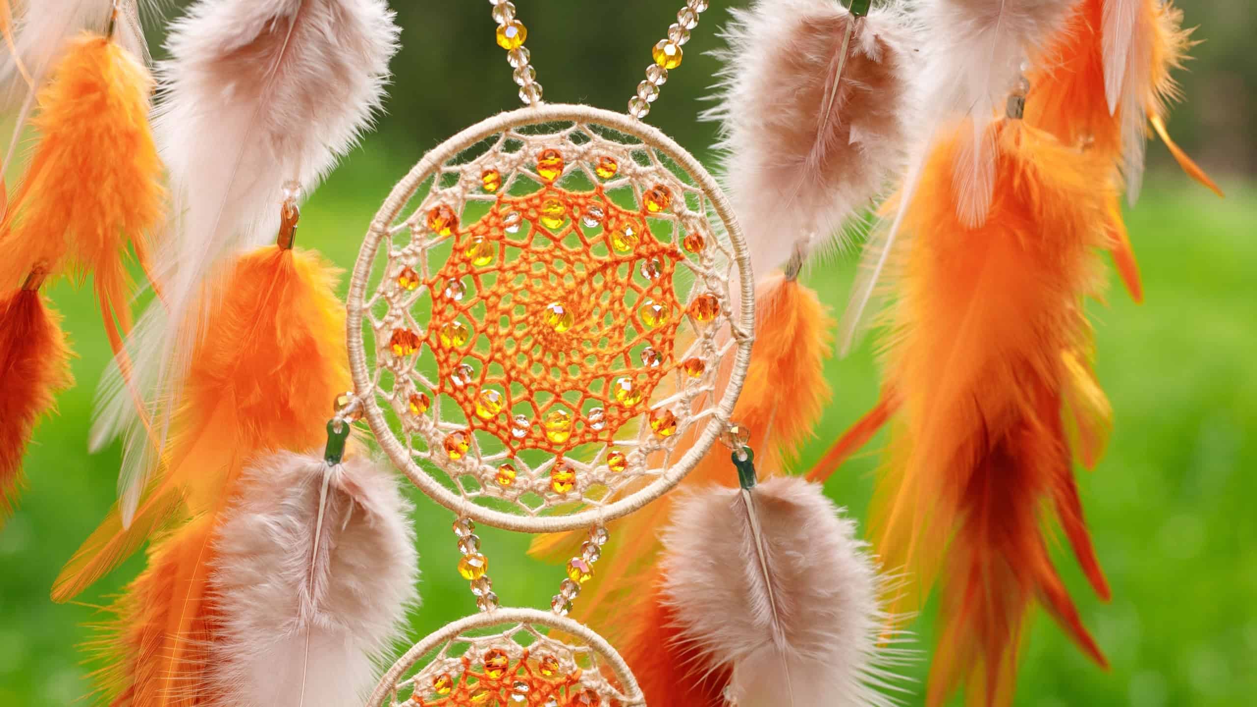 Dream catcher with feathers threads and beads rope hanging. Dreamcatcher handmade