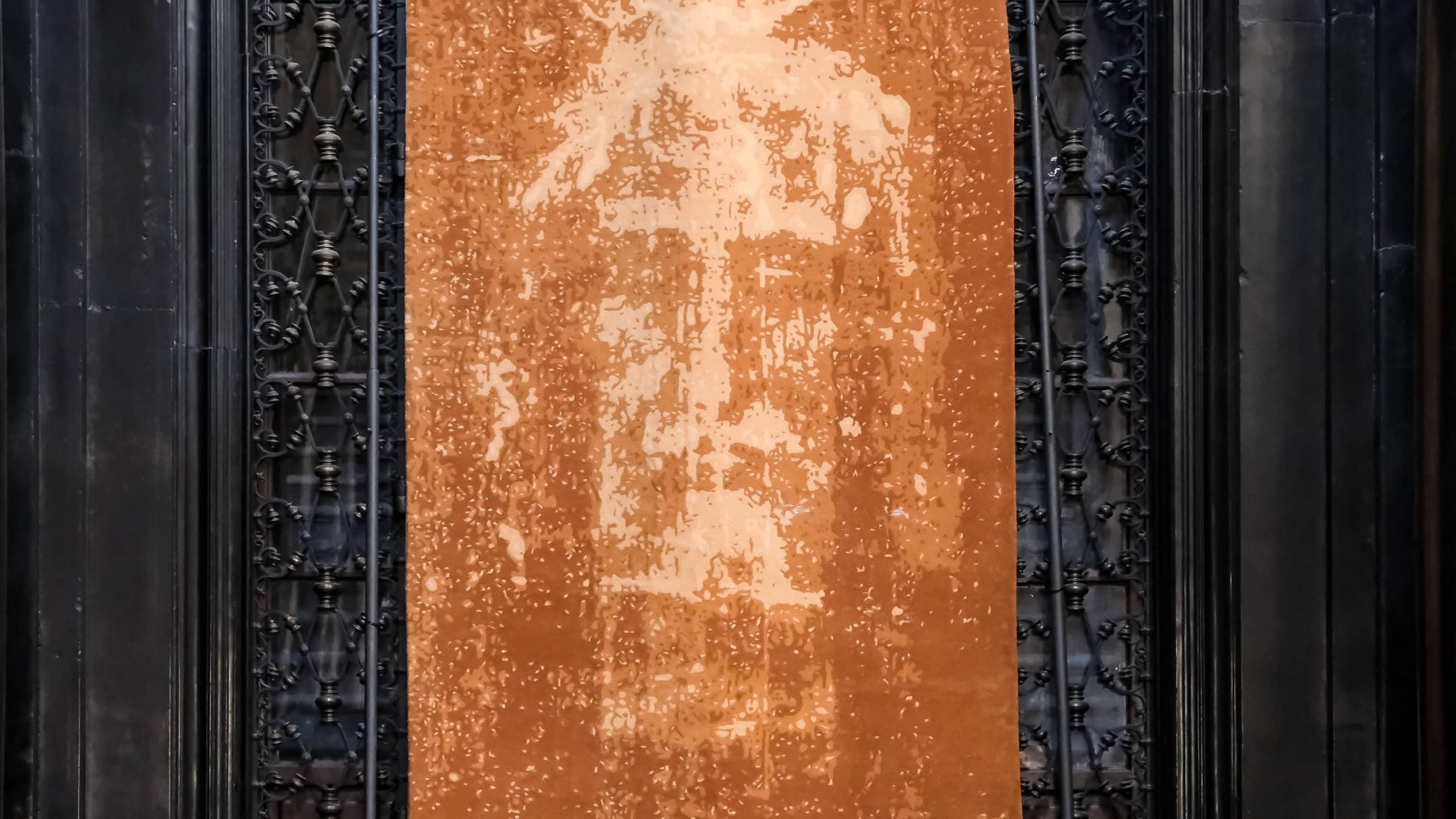 Picture of the Holy Shroud exhibited within the Turin Cathedral