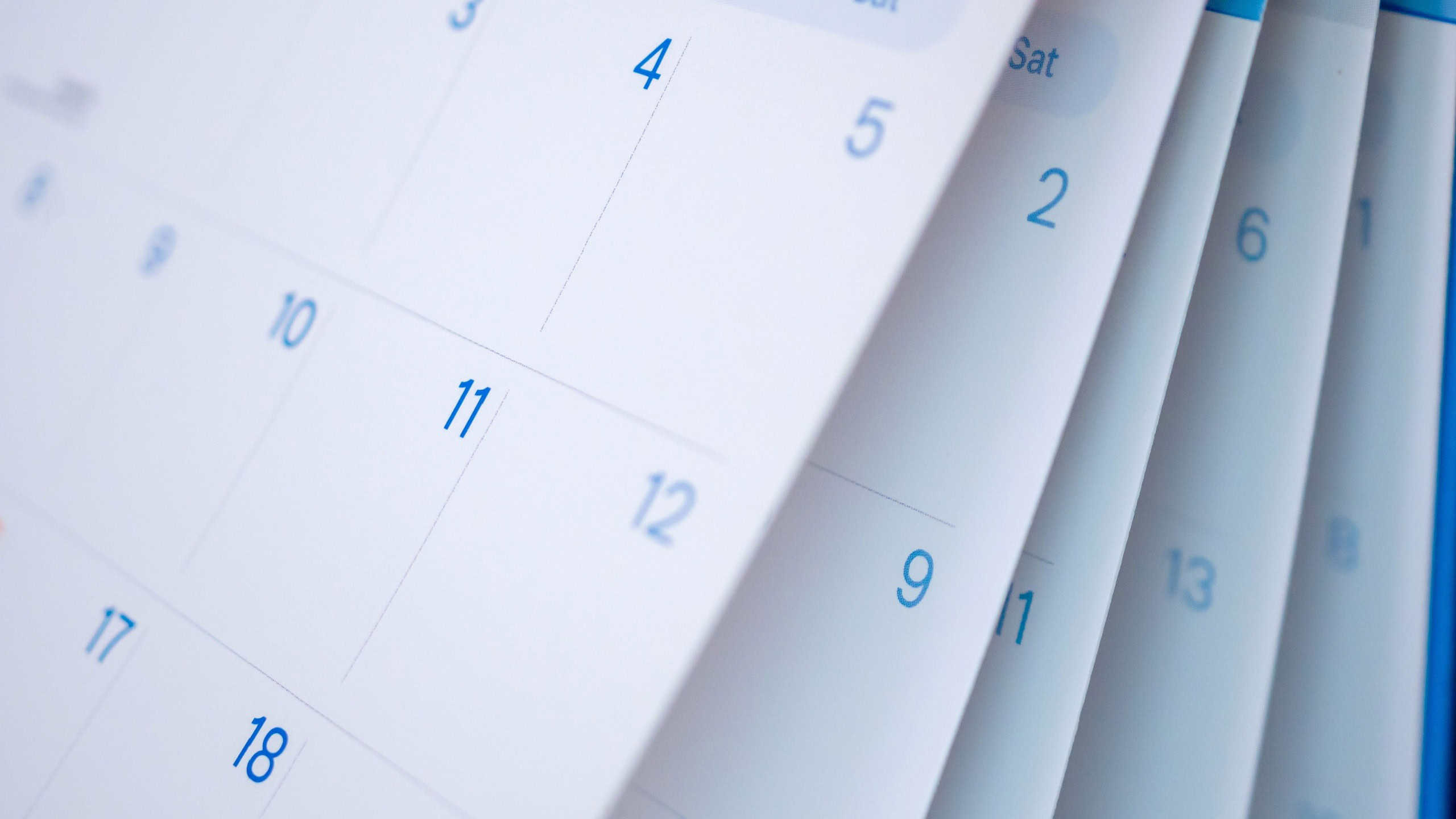 Abstract blur calendar page flipping sheet close up background business schedule planning appointment meeting concept