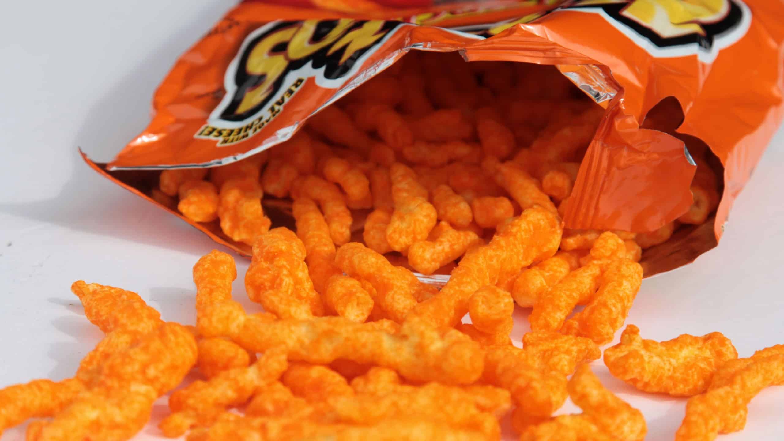 Lake Forest, California - USA - November 17, 2025: Cheetos. Cheetos is a crunchy corn-cheese puff snack brand made by Frito-Lay, a subsidiary of PepsiCo. In 2010, Cheetos was ranked as the #1 snack.