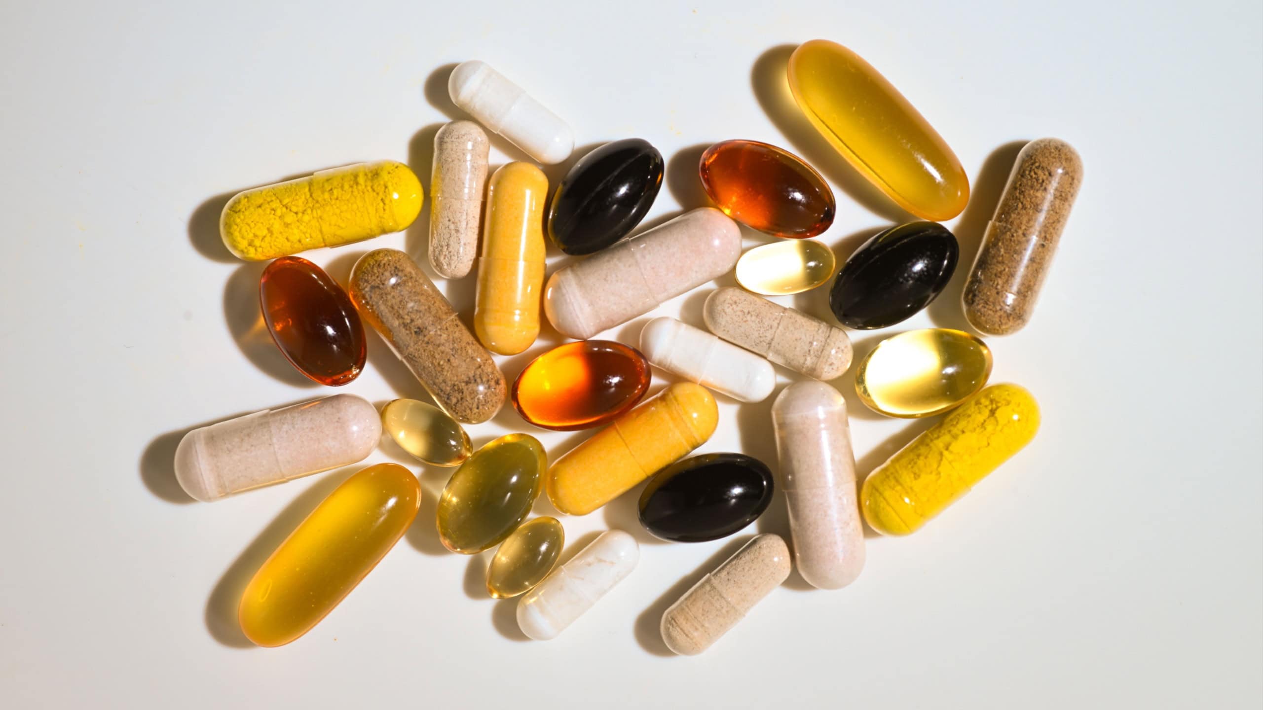 Assortment of Vitamins and Minerals on White background