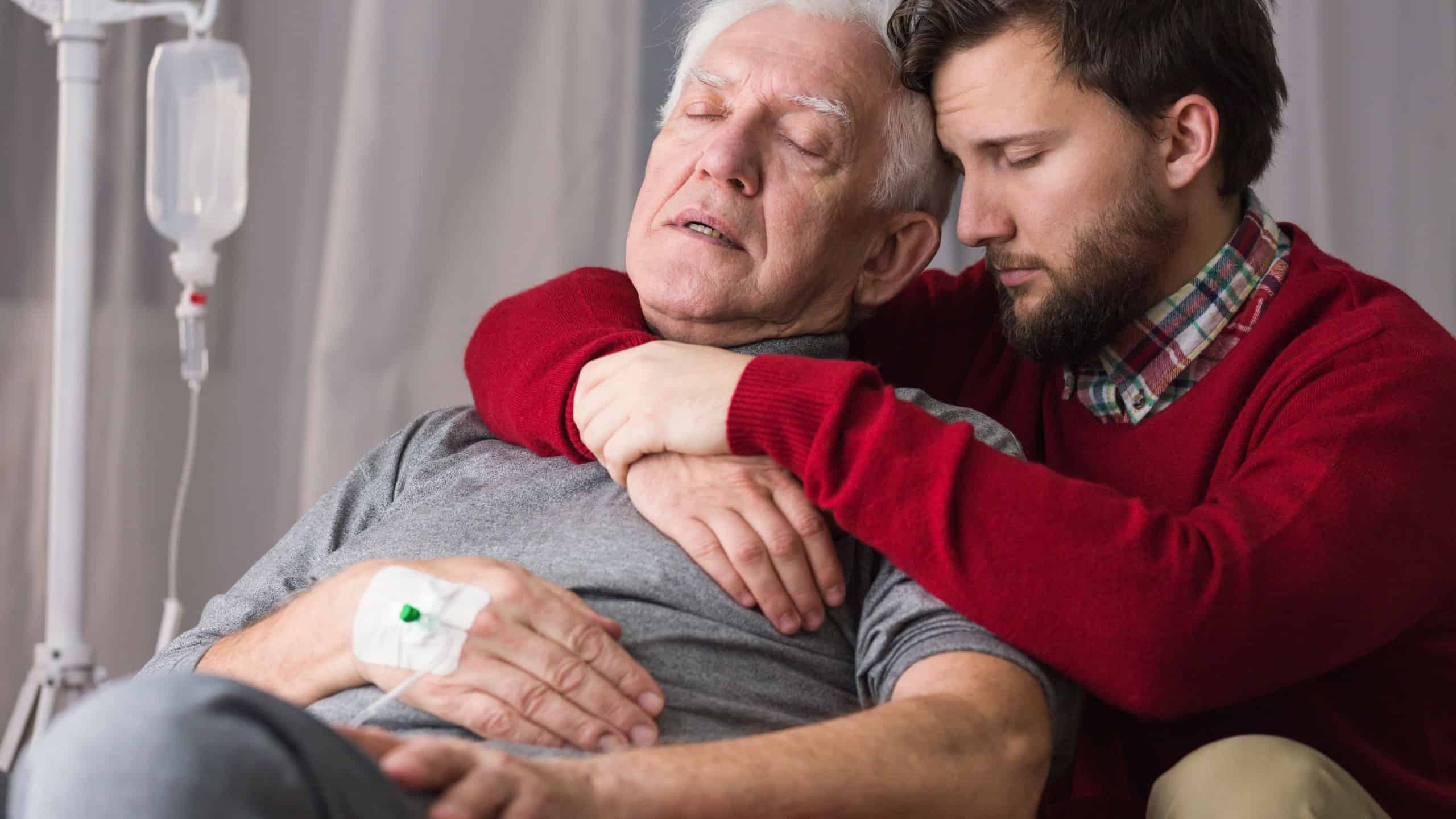 Image of last goodbye between dying father and son