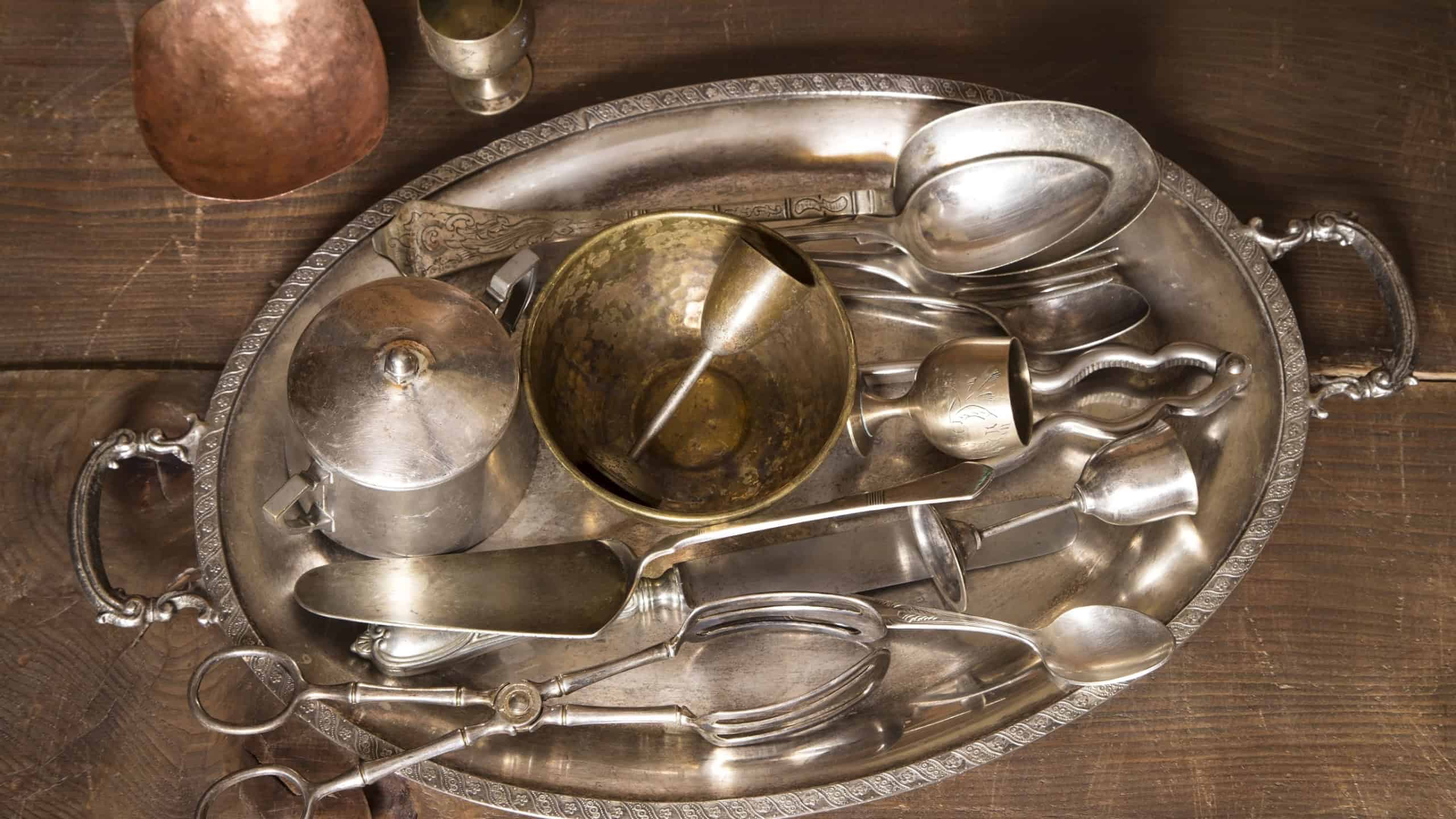 Vintage silverware on wooden background