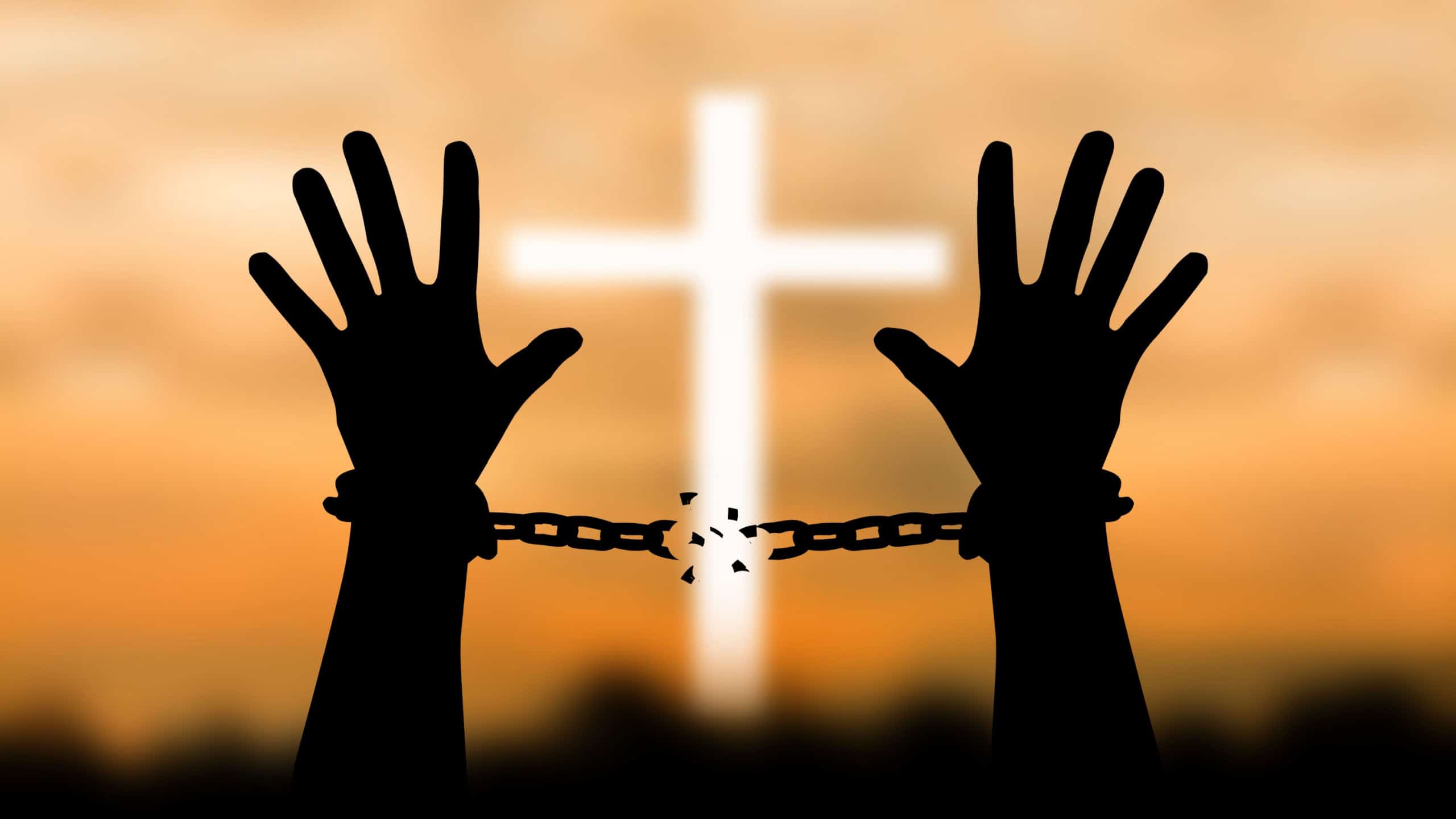 Human shadow image of human hand chain is absent. Get free.Background blurred cross