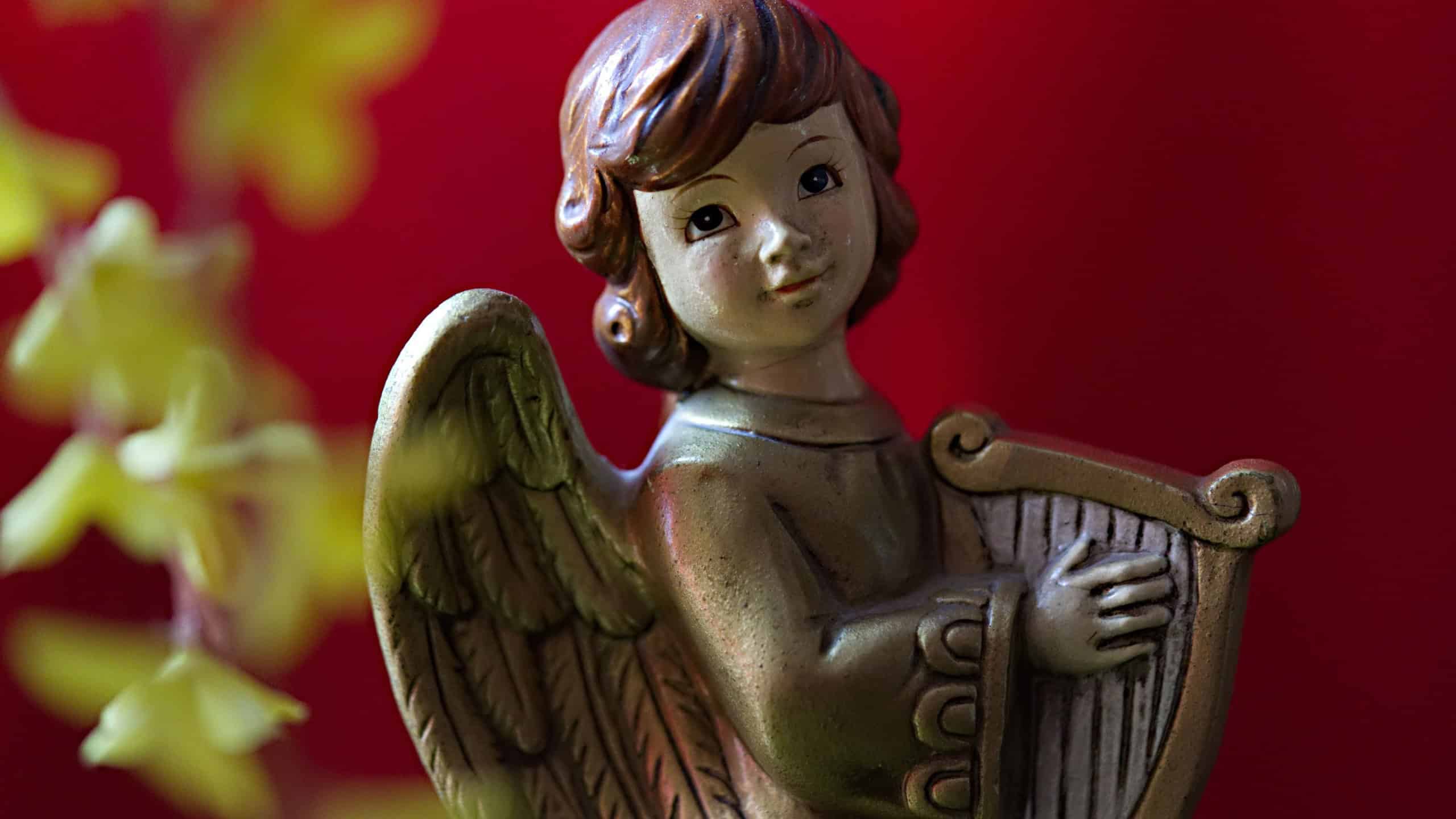 Figure of harp playing angel