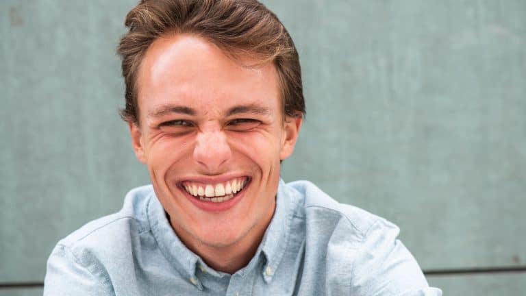 Close up portrait smiling young caucasian man