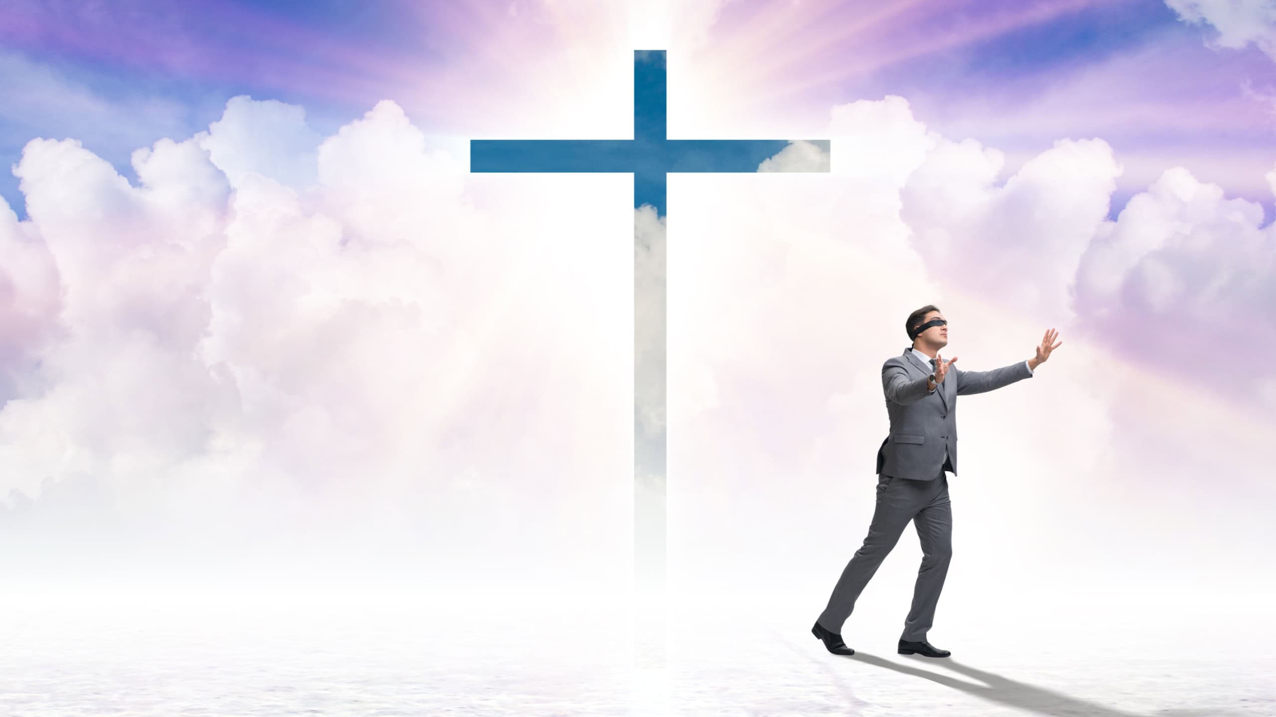 Religious concept with cross and lonely man