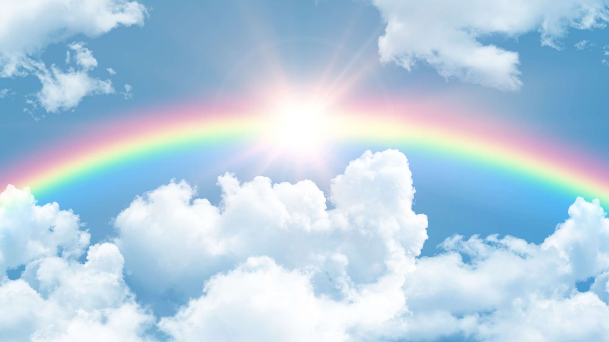 rainbow after rain and sun rays shining in blue sky. nature background. 3d stretch ceiling decoration pattern