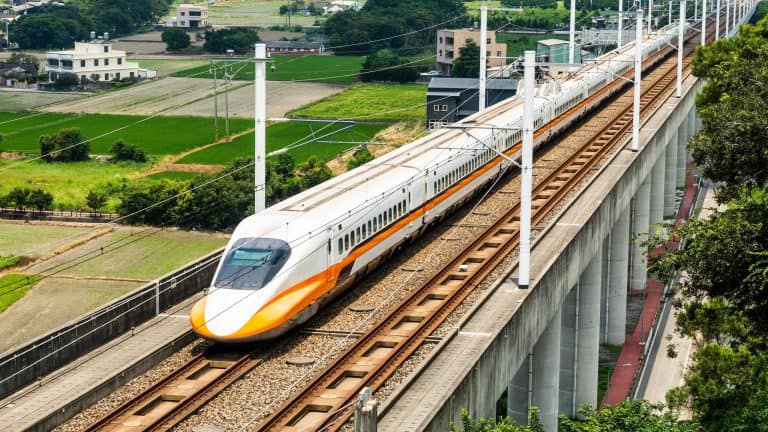 Taichung, Taiwan- August 27, 2023: Overlooking view of the Taiwan High Speed ​​Rail trains are passing through the Waipu of Taichung, Taiwan. It is the only high-speed railway in Taiwan.