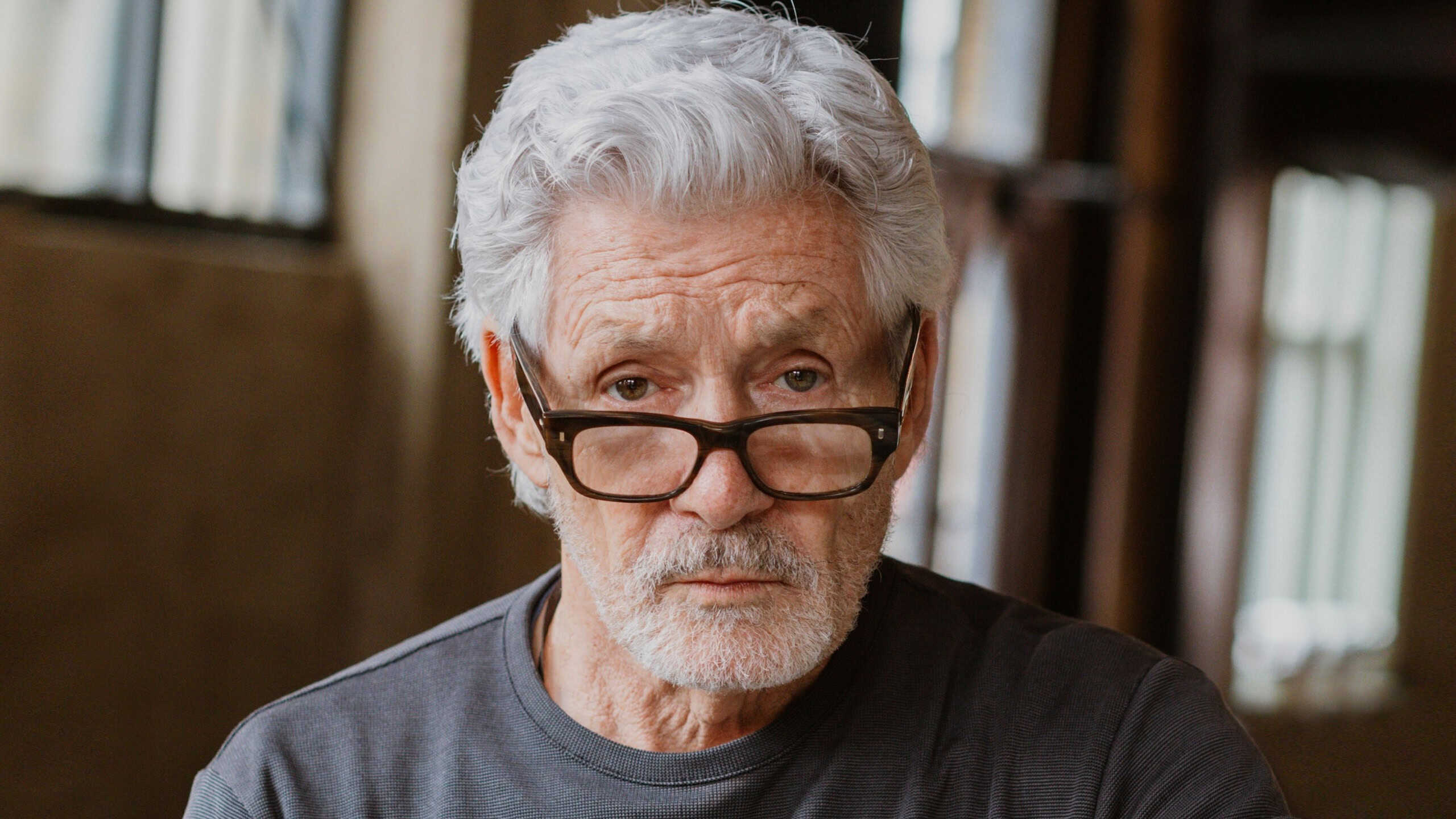 Serious senior man wearing glasses