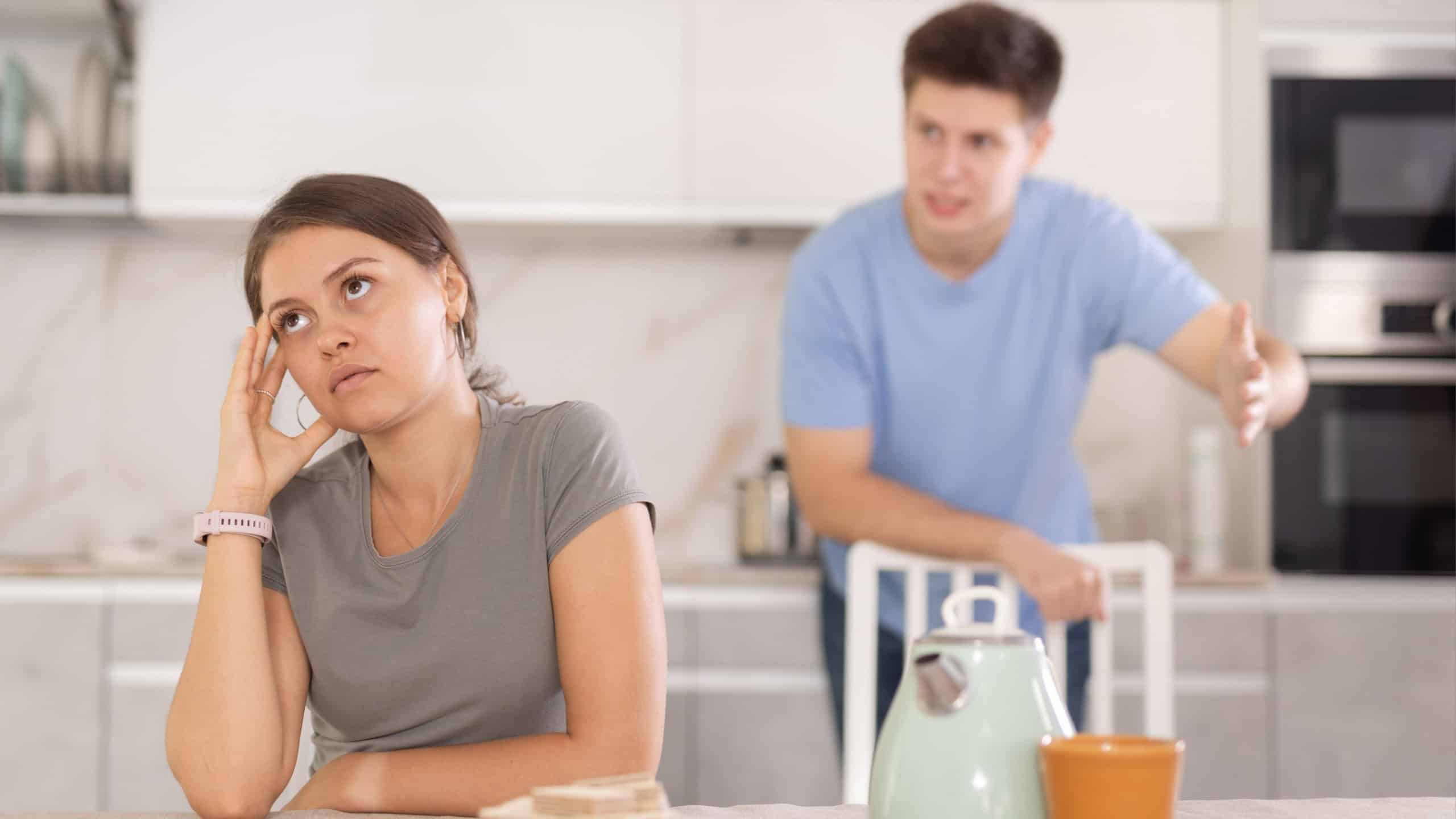 Angry guy swearing to young girl, family quarrel. Family violence, conflicts and relationship problems