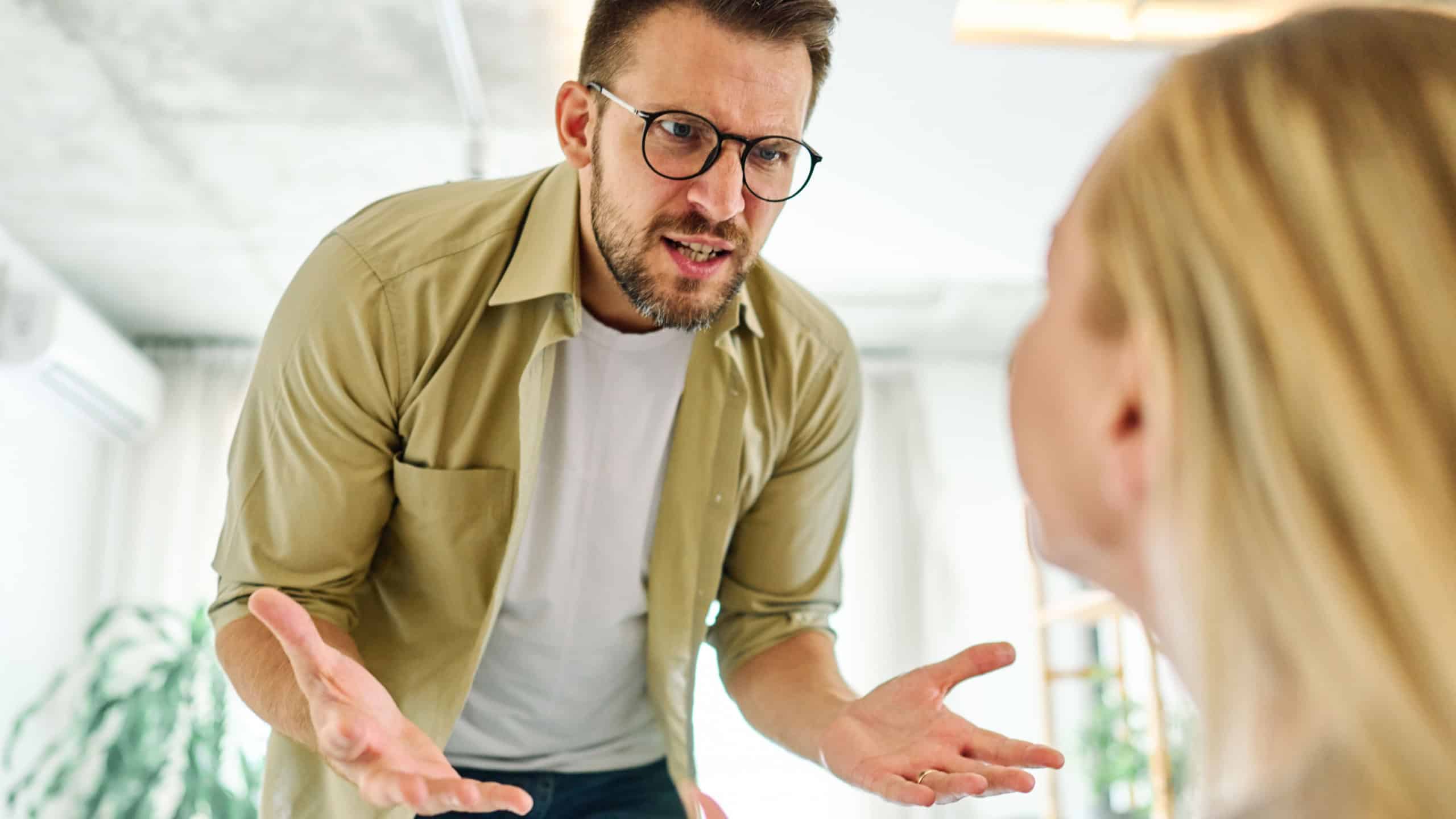 Two young people arguing at home, divorce fight marriage concept