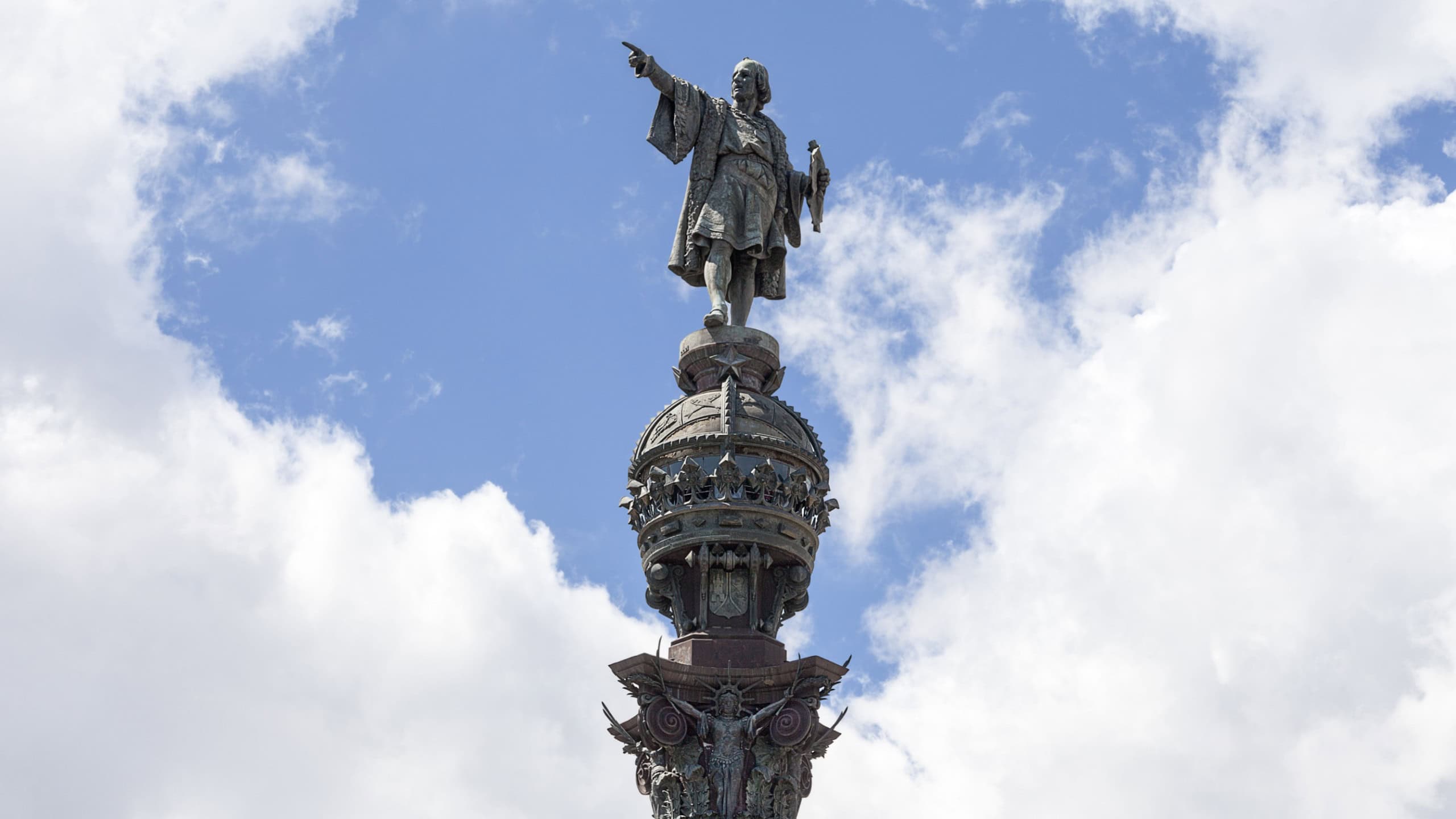 Details of Columbus Monument, Barcelona, Spain. Bronze statue sculpted by Rafael Atche, situated on top of a 40-meter Corinthian column.
