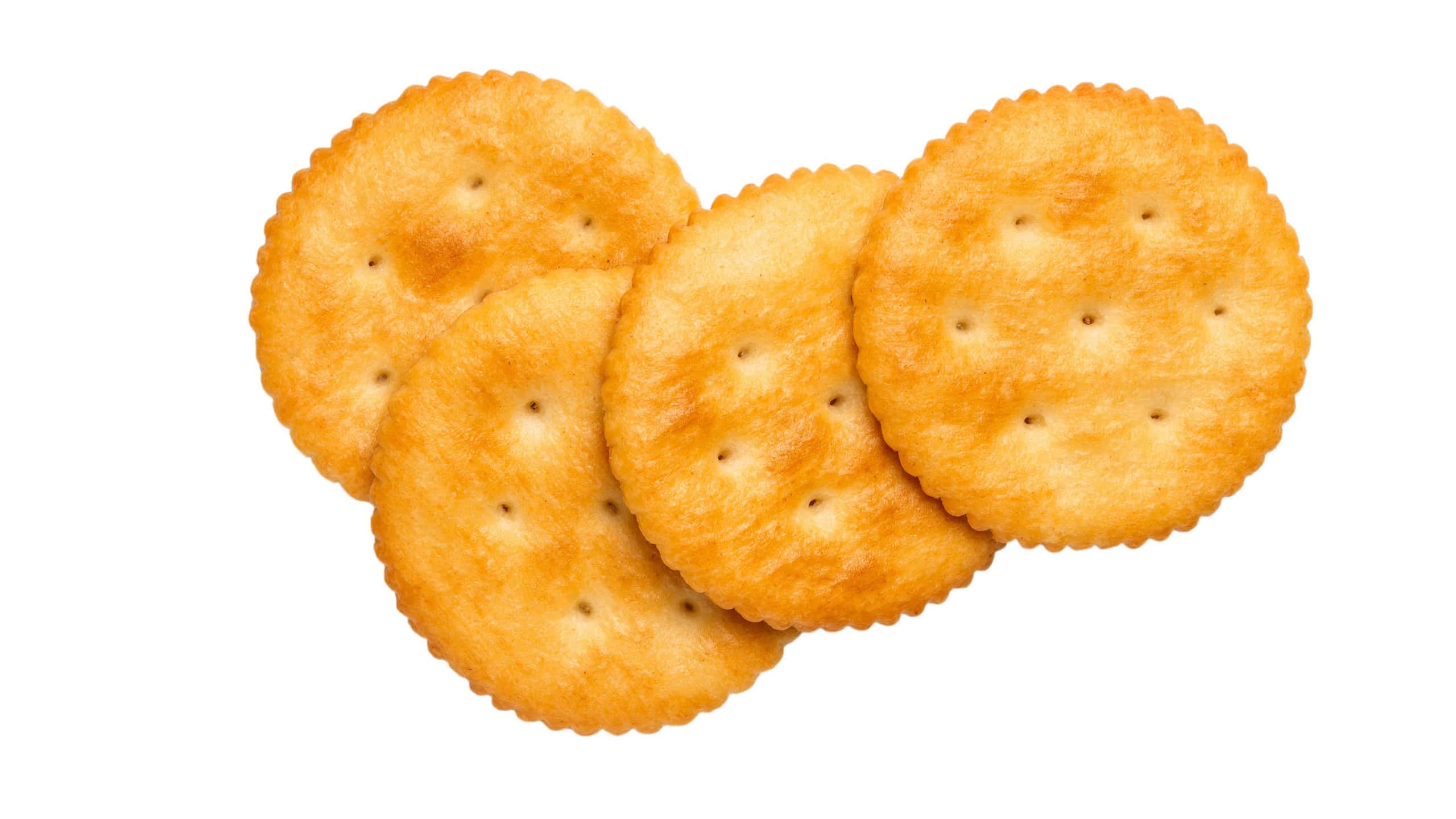 Dry cracker cookies isolated on white background cutout, top view, concept of food
